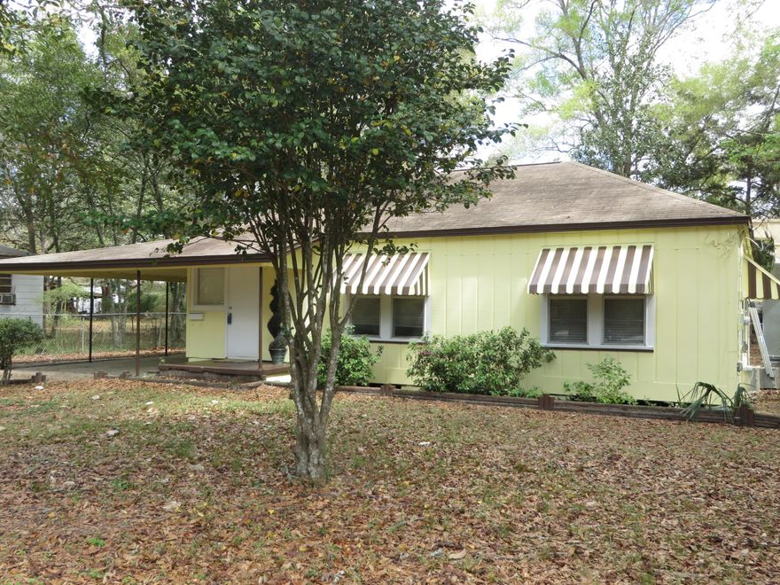 Don't let the age of this home scare you away. Surrounded by Majestic old trees, and a great place with original wood floors, 4 bedrooms and 2 baths. There is some crown molding and chair rail in the home, and roof is about 3 years old. Kitchen overs a stainless sink, side by side refrigerator and gas stove. Home has original tiles in both bathrooms taking you back to the vintage feel in this home. Out back is a large 20x16 storage building with power. Home is located only minutes to Lincoln park and only minutes to Eglin AFB. Don't let this quaint home get away from you, it is a great opportunity to own your very own home. For your peace of mind seller is offering a home warranty.