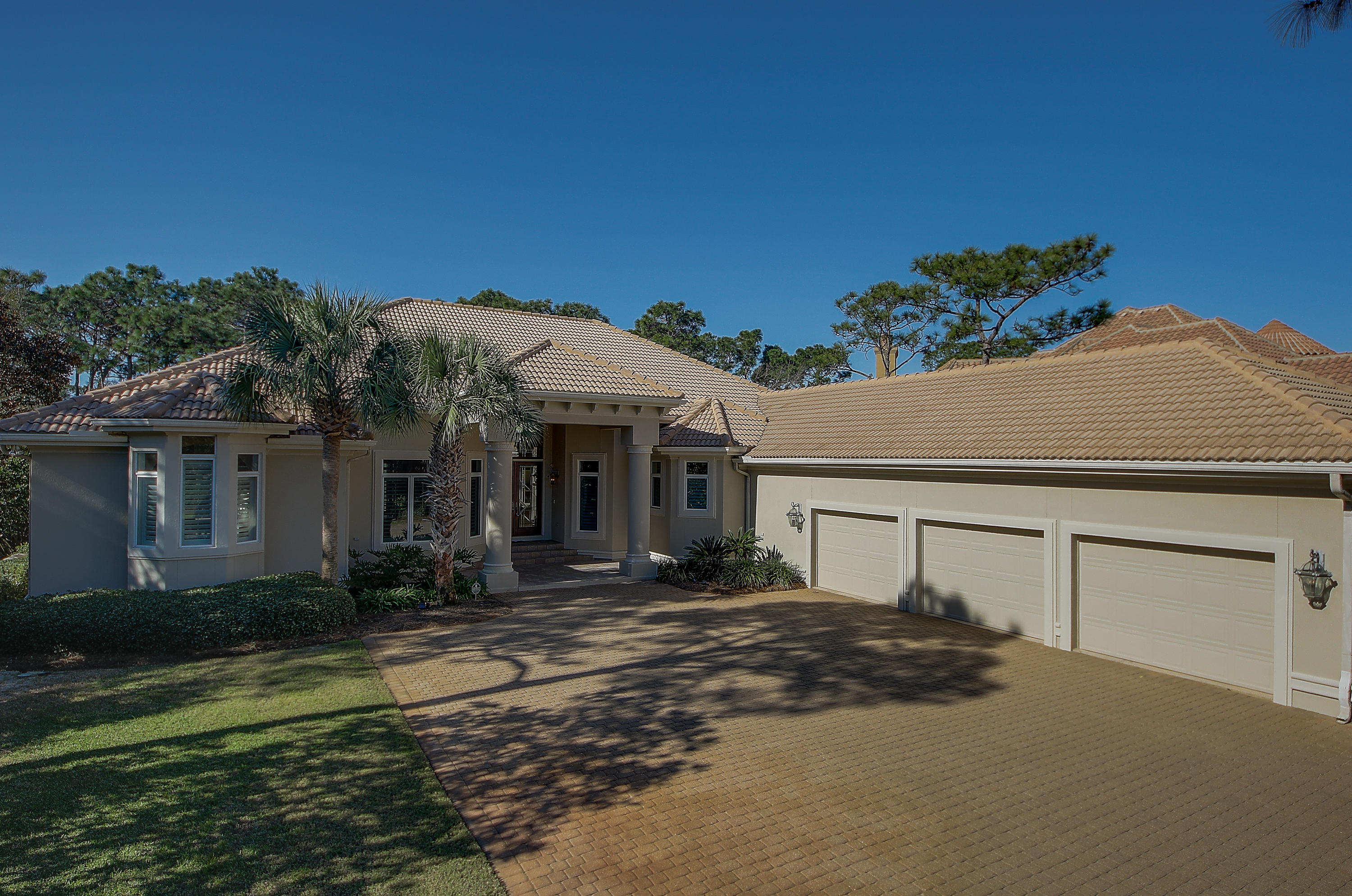 A unique opportunity rarely available in Burnt Pine... 4 Bedrooms, 4 Full Baths, all on ONE LEVEL, located on the 17th Fairway of the Burnt Pine Golf Course. Perfectly situated on a private cul-de-sac street with very little traffic. An estate sized home on an estate sized lot with tranquil views of the golf course and lake. Incredibly spacious, open floor plan, with ample room for entertaining. This home has everything one would expect in a Burnt Pine home, including a screened lanai and pool. The sleek kitchen is sure to impress and features an abundance of cabinets. Split bedroom floor plan provides privacy for the master suite as well as guest suites. Separate study with french door entry way and beautiful built in cabinetry. The large circular drive offers easy access in and