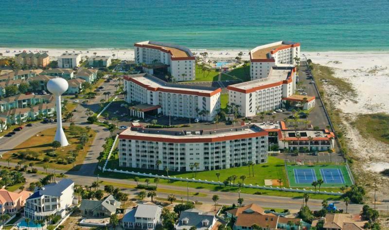This Beautiful 4th floor upgraded Unit has Tile through out. Kitchen and bath have been up-graded. Fully furnished, Large Storage space just inside door. Beautiful view of the sound where you can sit and watch the boats and dolphins go by and catch the Sunset as you relax from a great day at the beach.The El Matador is a unique Resort with 10+ acres beautifully landscaped. Just steps from the Gulf of Mexico. El Matador has two pools the one close to the unit is heated in the winter, tennis courts, basketball court, fitness center, with both a large and small banquet room that can be rented for parties. There are BBQ pits with tables and benches for your enjoyment. El Matador Also has 24 hour Security