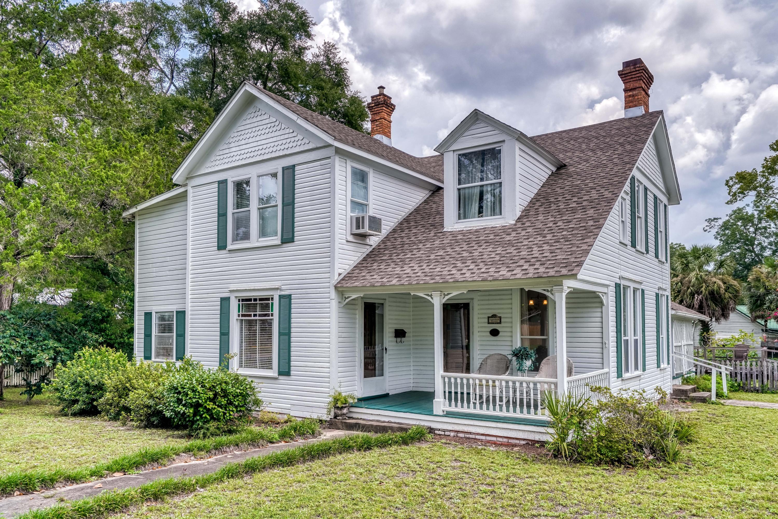 Situated on a corner lot in the heart of historic DeFuniak Springs, is a hidden treasure waiting for the perfect person with imagination to turn it into their dream home. Built pre-1900, this one of a kind home has loads of potential and walking distance to the lake yard. Homeowner claims the wall between the kitchen & dining room is non-load bearing making it removable, creating a more open concept design. A first floor master bedroom, includes two attached rooms that would allow for a walk-in closet and expansive master bathroom addition. Upstairs features 2 spacious bedrooms with a small bathroom, also with an attached space that could be incorporated making a much larger guest bath for both bedrooms to share. Many of the homes original features are still in tact including antique windows & doors, two fireplaces, and more. If you've ever dreamed of owning a historical home, and you have the creativity to turn your dream into a reality, this home is for you! This incredible property is along the main entry route to the annual Christmas Reflections tour, so if you enjoy the holidays, thats one more reason not to miss out. With nearly a third of an acre of land, walking distance to downtown, and conveniently located to shopping and restaurants, whats not to love?