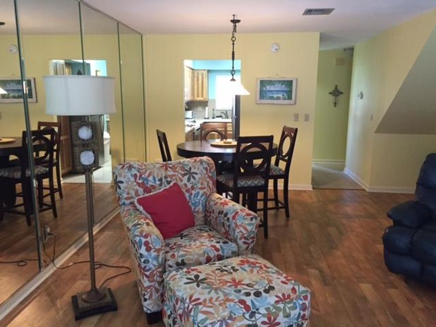 BEAUTIFULLY RENOVATED FULLY FURNISHED END UNIT!! Nothing has been spared! Kitchen features upgraded wood cabinets, CORIAN counter top and sink, tiled floors and new refrigerator. Spacious living area has an open and inviting atmosphere with DESIGNER DECOR and beautiful wood floors. with a full bath downstairs and hide-a-bed sofa in living area, it is like gaining a COMPLETE ADDITIONAL SLEEPING SPACE! Enjoy peace and serenity on your upper or lower balconies surrounded by lush landscaping offering TOTAL PRIVACY. Plenty of interior closet space, built in bookcase, custom blinds, two outdoor storage closets, new windows and only STEPS TO BEACH WALKOVER! Enjoy open green spaces, pool, tennis court, shuffle board and a very special warm welcoming community! A great investment awaits you!