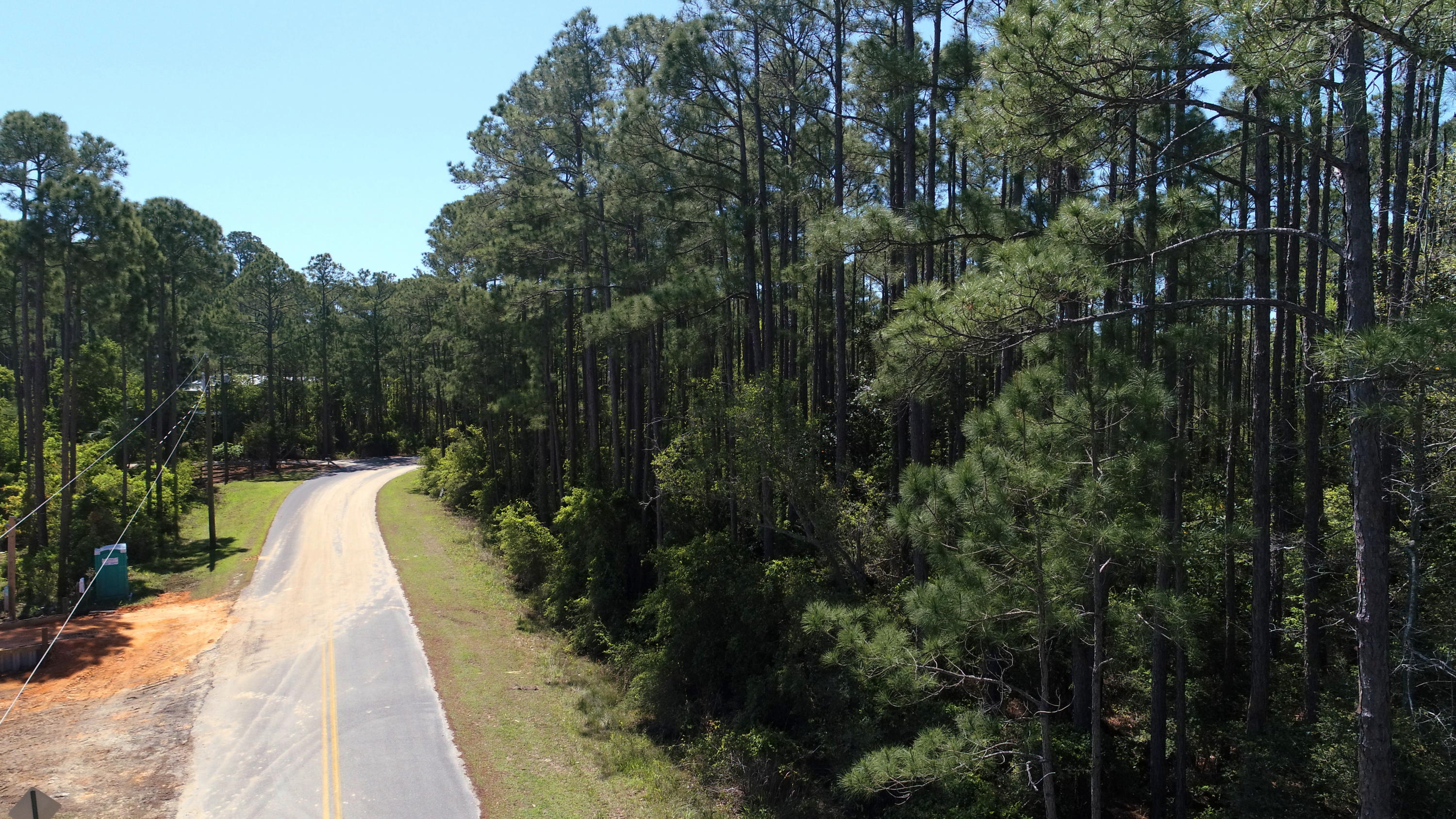 WHISPERING PINES - Land