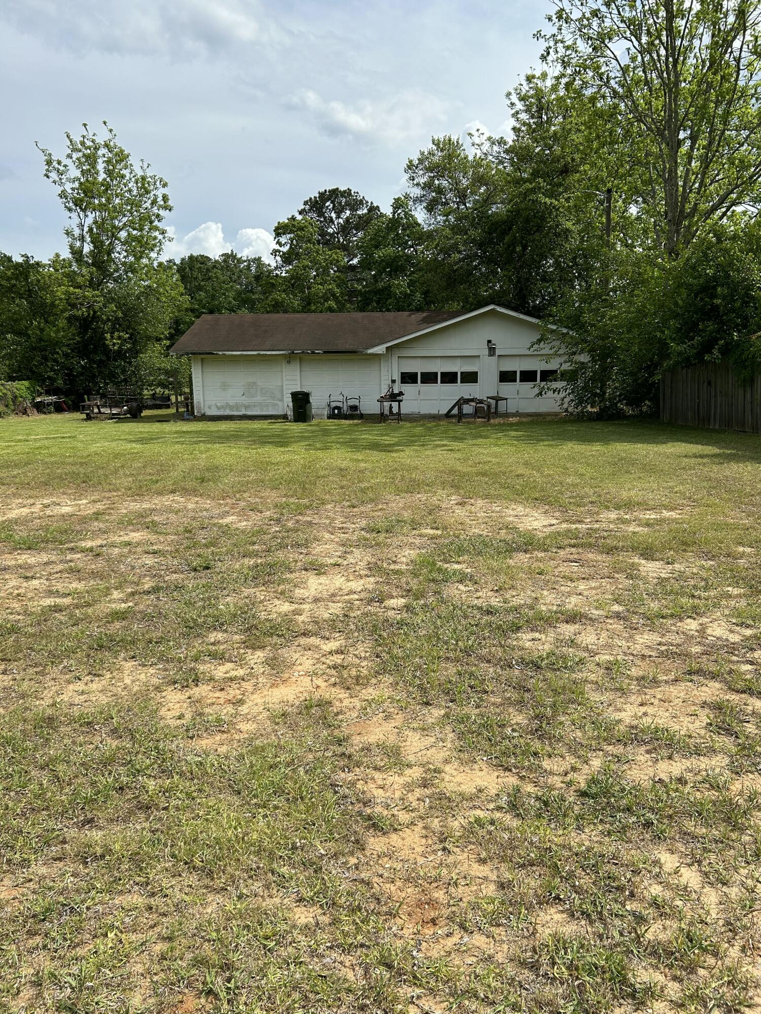 Vacant Lot with garage located on back of property.
