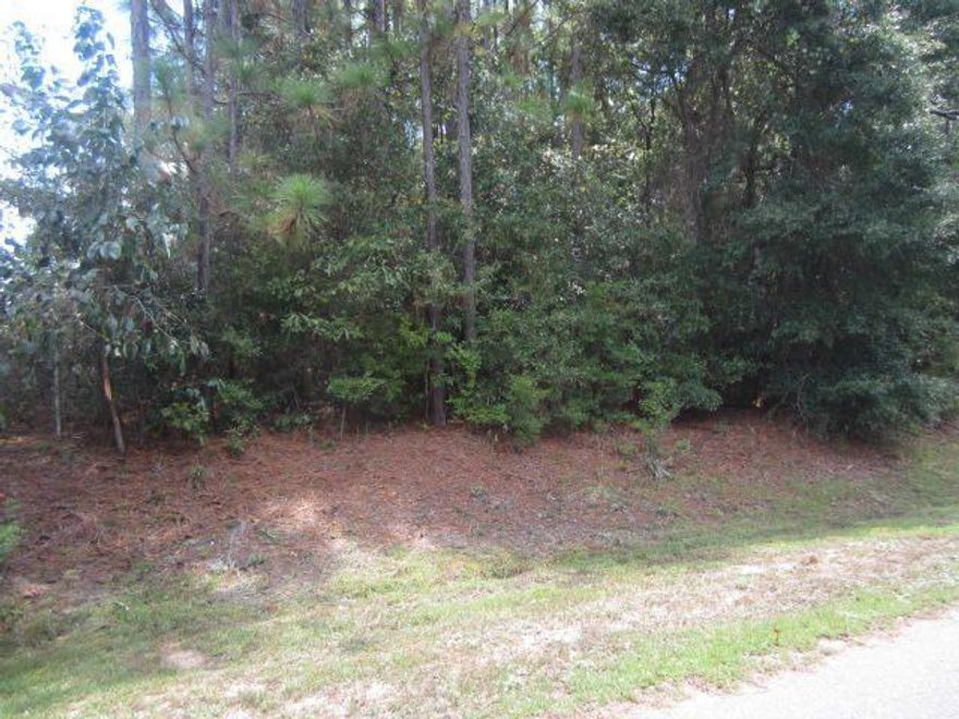 BEAUTIFUL 1.78 WOODED VACANT LOT READY FOR YOUR NEW HOME TO BE BUILT IN THE SERENE SETTING LOCATED IN THE DEVELOPING SUBDIVISION OF KENNEDY LAKES. PART OF THE REAR OF THE LOT FRONTS LAKE SUSAN AND IS AVAILABLE FOR YOUR ACCESS. KENNEDY LAKES IS CONVENIENT TO THE TOWN OF CRESTVIEW AND AREA SCHOOLS .BUYER TO VERIFY ALL LOT DIMENSIONS AS DIMENSIONS LISTED ARE APPROX. THERE IS A SURVEY IN THE OFFICE FOR YOUR REVIEW. PROPERTY IS LOCATED WITHIN THE CITY LIMITS OF CRESTVIEW.
