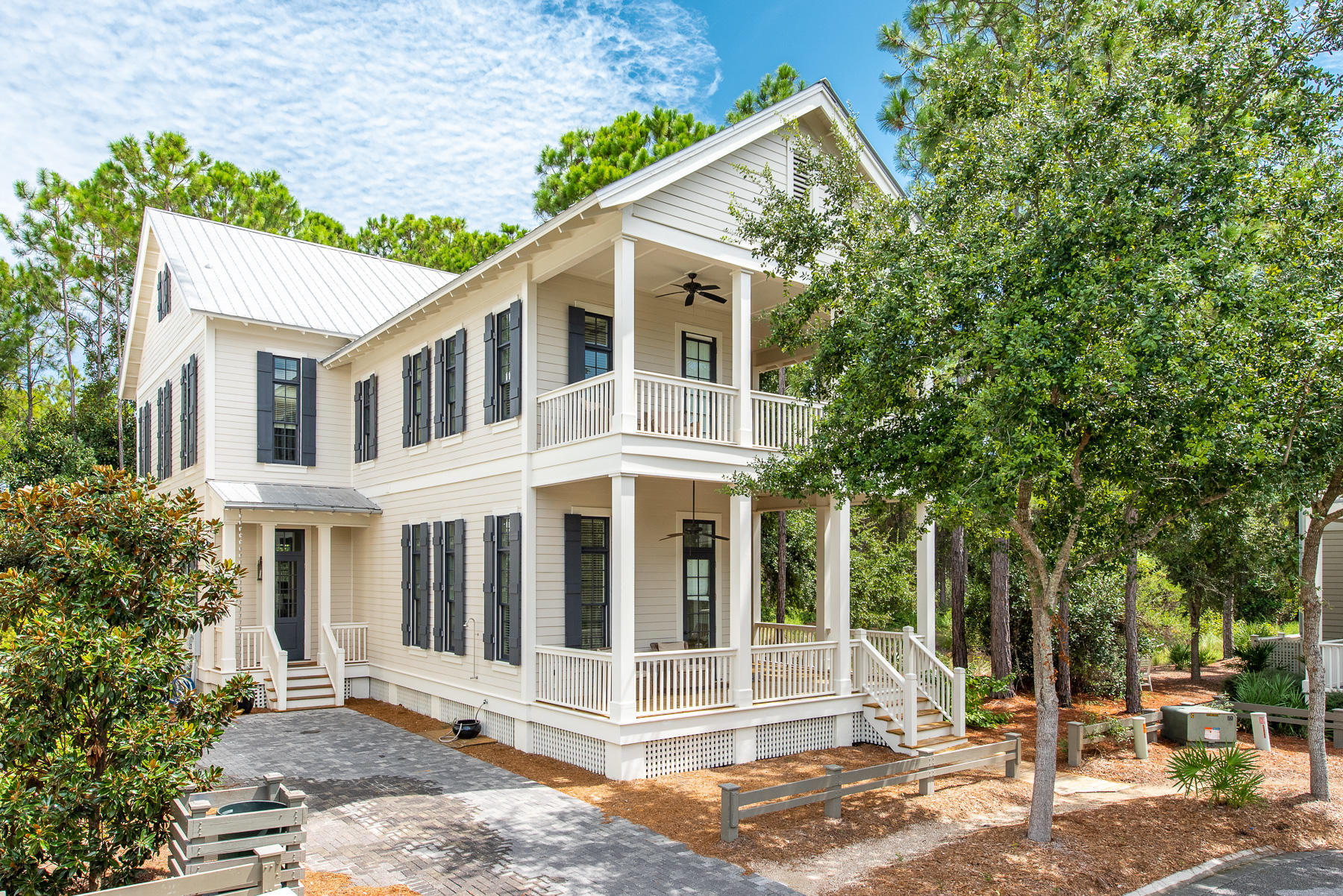 This gorgeous 4 bedroom, 4 bath home with room for a pool is a must see! Recently Renovated and professionally designed with approximately $300K of improvements. Prime location only steps to the newly expanded Camp Watercolor and a short ride to the beach, Watercolor Crossings or Seaside. Home features a beautifully renovated gourmet kitchen,12 foot ceilings downstairs, fireplace, hardwood floors and it has ample room for a pool. The first floor features a king bedroom. On the second floor, you'll find two additional king suites and a custom designed bunk room. There is also an additional living space with coffee and beverage bar. The house is on a quiet cul-de-sac backing up to Nature Preserve and has over 1300 sq. feet of wrap around porches overlooking the park.