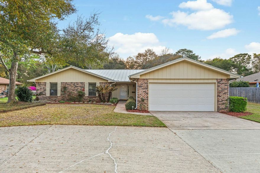 Get ready to call this spacious, golf course home with a covered pool yours - just in time for summer. This brick home with a metal roof is situated on .4 acre lot. Lake Lorraine Estates is nestled away from the hustle and bustle for ample time to relax or entertain. Just minutes from the beaches and military bases. From the moment you walk in, you will feel the warmth of a home that has been well loved and is now ready for the next family to take ownership and start making memories. The kitchen and baths have granite countertops, spacious garage, indoor laundry, screened in pool, and don't forget the oversized bonus area that can be used for entertaining or hosting large family gatherings. New toilets, faucet fixtures, and some light fixtures. This home is a must see!!