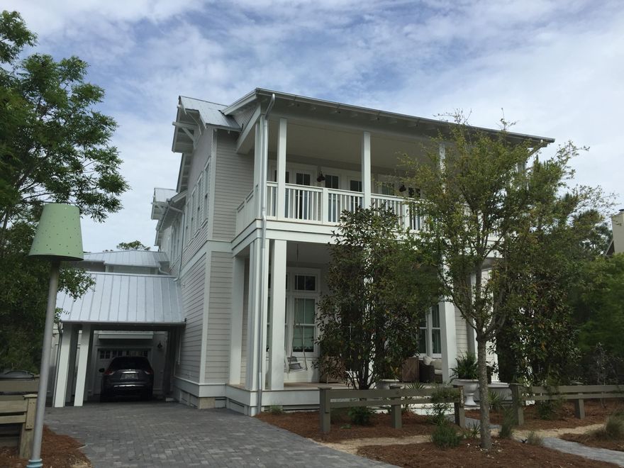 Brand New Romair home in phase 2 Watercolor. Home offers a great outdoor entertaining area with pool. One of the larger lots in Watercolor backing to nature preserve
