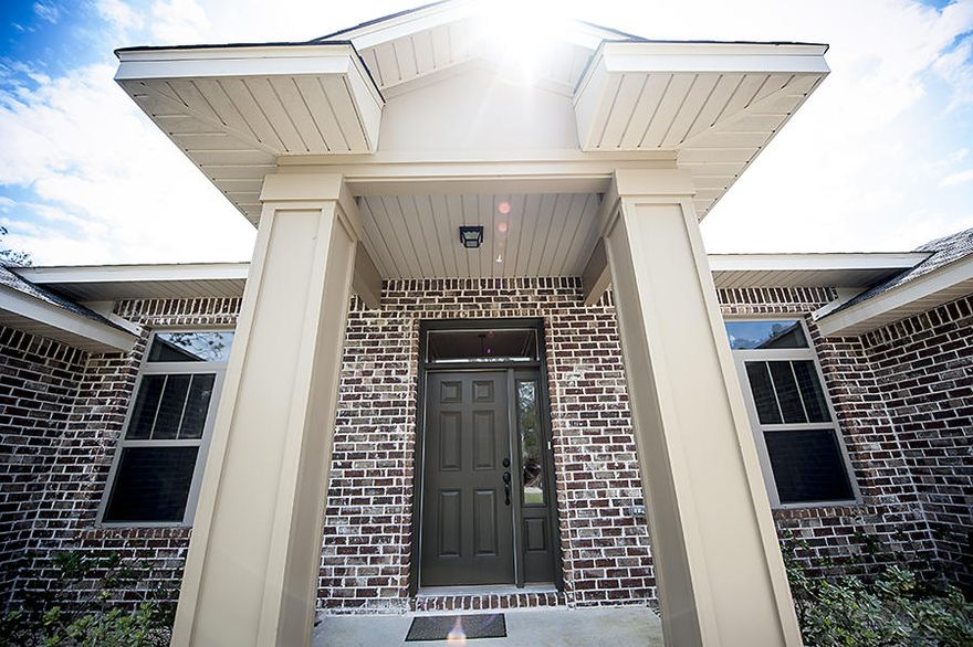 Only 2 years old, this Robbins built home has a spacious, open and split floorplan that is just what you are looking for! Beautiful 18 inch tile throughout most of the home, except in the bedrooms, where you will find durable frisee carpet. Upgraded plantation shutters on the front of the home with cellular shades throughout the remainder of the home. The guest suite on the back of the home has a separate bedroom and full bath for your guests. The other two bedrooms are located at the front of the home and conveniently connected by a jack and jill bathroom. All bathrooms have cultured marble countertops and oiled bronze fixtures. In the kitchen, you'll be prepping meals on the large granite island overlooking the main living area! The large master bedroom has