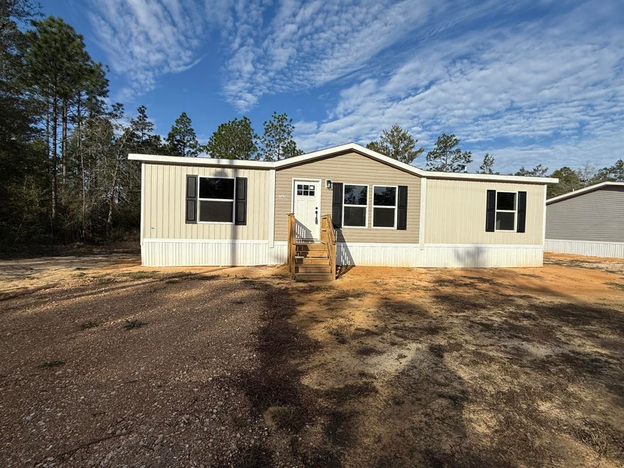 10K Price Reduction!! Brand New Mobile Home (DeSoto model by Clayton Homes). Open concept home with a beautiful kitchen, 3 bedrooms and 2 full bathrooms. Sliding glass door opens up to the back deck, which is perfect for a Grill, sitting/reading area or, a nice entertainment space.