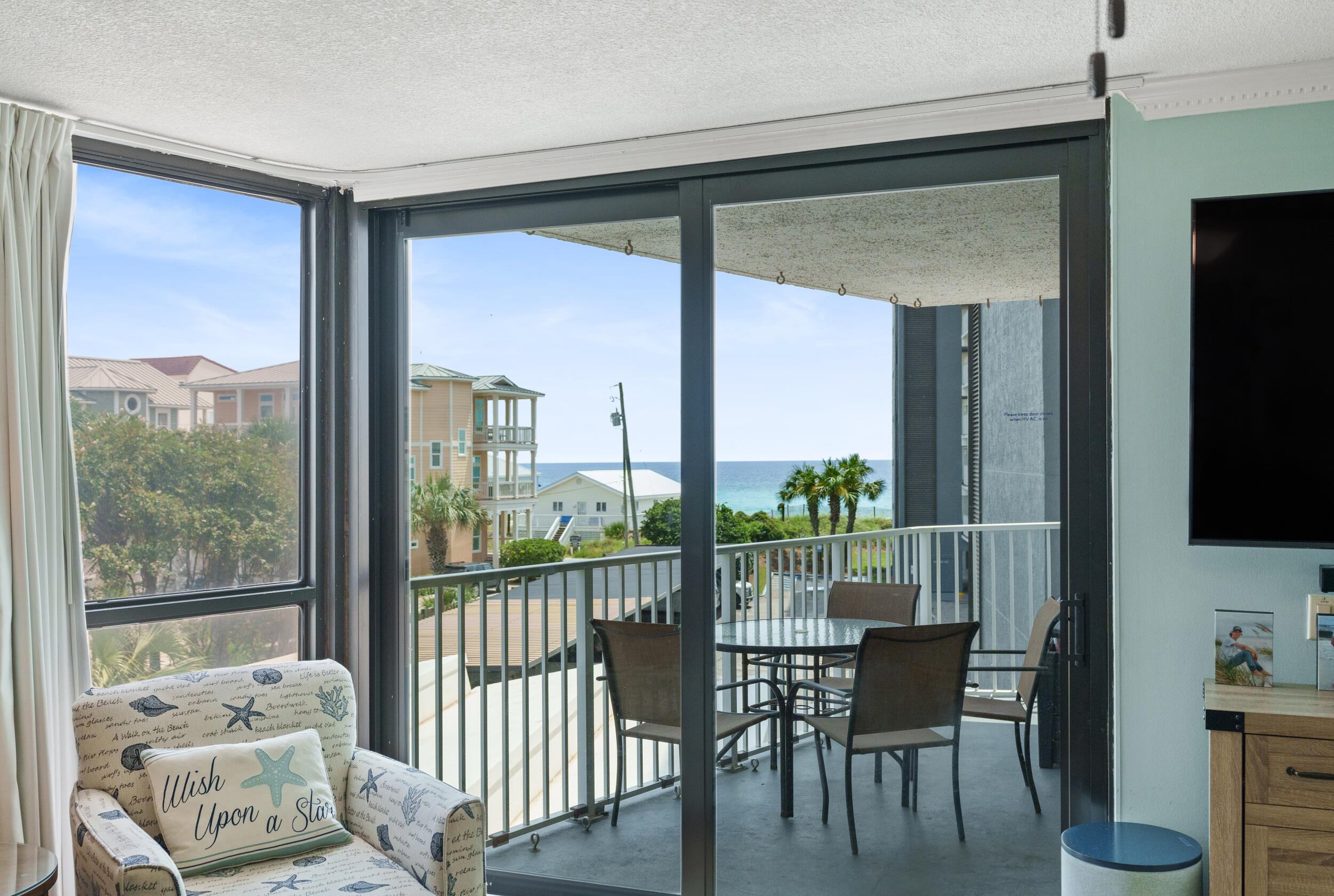 Priced to sell! This is a one-of-a-kind opportunity to own a 2 bed/2 ba gulf front condo just steps from the beach and comes with its own covered owner's parking. The floors are all tiled for easy beach living. Crown molding throughout and NO popcorn ceiling. The living room and primary bedroom access the balcony that has a gulf view. The unit is being sold fully furnished and rental ready and comes with extra storage. Located in the gated and guarded Mainsail community, you'll enjoy 700 feet of deeded private beach, two pools, tennis and pickleball courts, basketball, shuffleboard, a fitness center with vending, covered parking, and courtesy security patrol. Perfectly positioned on Scenic Gulf Drive across from Silver Sands Outlet Mall and close to fine dining, shopping, golf, fishing, and world-class water activities along the Emerald Coast.