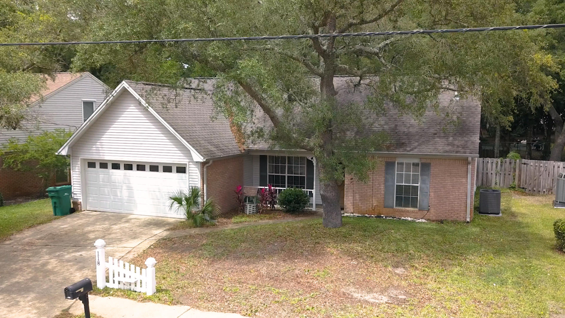 Check out the Virtual Tour! Welcome home to this 1,796 sq ft, 4 bed/2 bath home that has direct access to Cherokee Park! Wonderful house - close to base - with great schools - at a great price...What more could you ask for?! As you enter, you'll see the large living area, beautiful exposed beam in the high ceilings, and the dining area to your left. Through the kitchen, you'll see the perfect little breakfast nook. This split-entry floor plan has the master bed/bath beyond the kitchen and two other bedrooms and the guest bath on the opposite end. The 4th bedroom is upstairs and has a built-in shelving and plenty of natural light through custom windows. Outside is a quiet neighborhood with sidewalks, a fenced back yard, and direct access to a great local park. Call today!