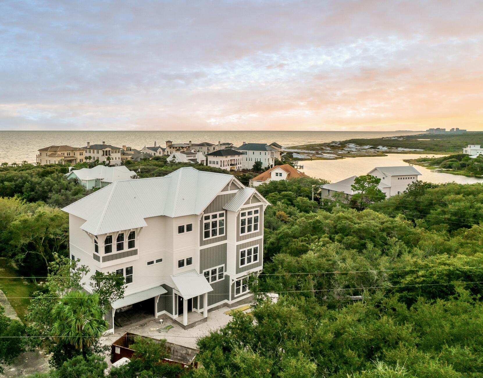 VIEWS - VIEWS - VIEWS This Beach Highlands residence has unobstructed and sweeping views across Tops'l State Park to the Gulf of Mexico and Stallworth Lake. This beautifully designed, 6 Bedroom, 5.5 Bath residence is the perfect beach home, investment property, or as a second home getaway with family and friends. Beach Highlands neighborhood features multiple convenient beach accesses. With 4910 square feet of interior living space, the home features four oversized balconies and a pool where you can relax at the beach and enjoy the breezes from the gulf of Mexico in a tranquil setting overlooking the park and the Gulf of Mexico. Completion will be in march, Just in time for summer! Call today to schedule your personal tour of this amazing residence. Buyer to verify dimensions.