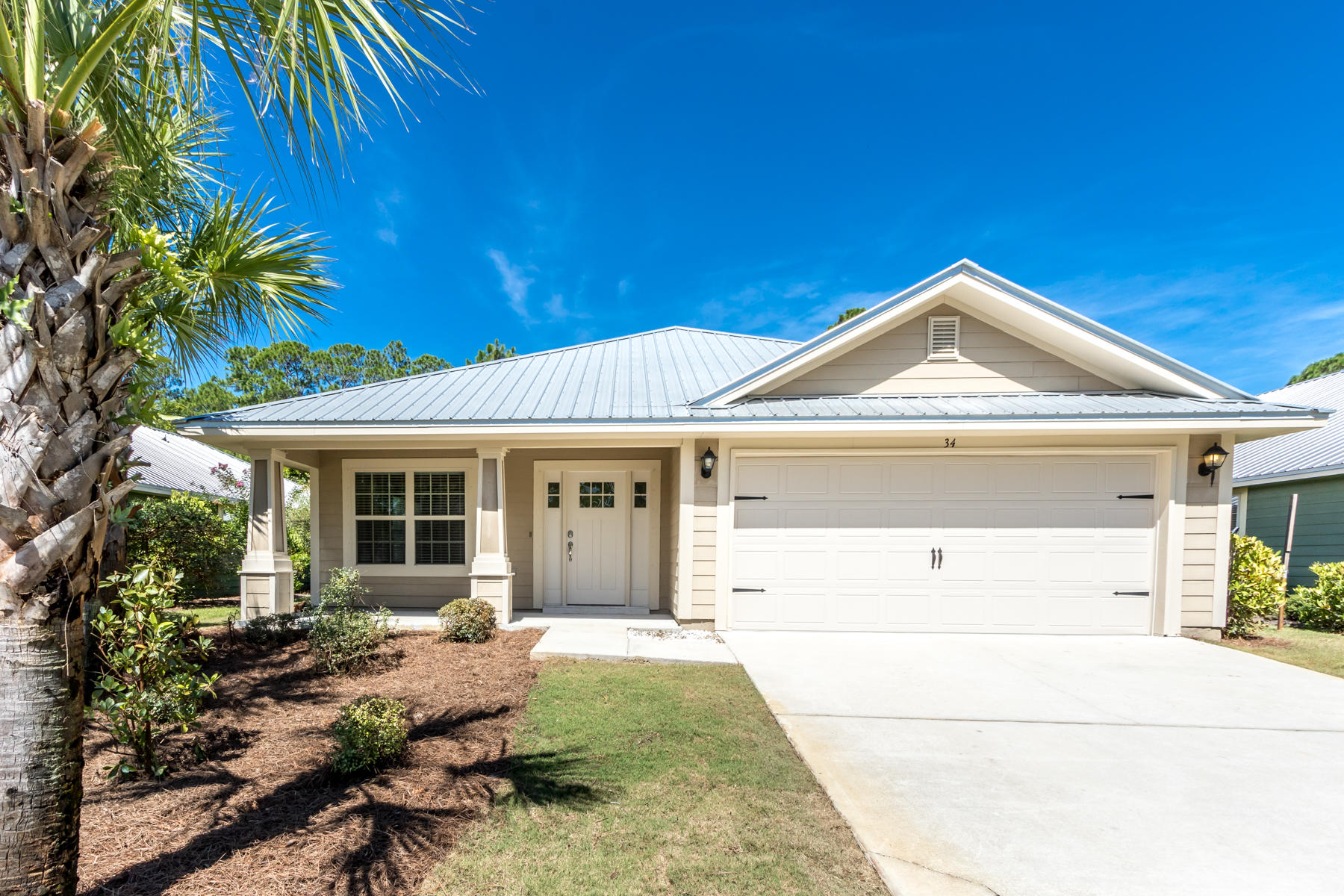 Welcome to 34 Brook Court! Tucked away on a quiet cul-de-sac near the Choctawhatchee Bay in the Eagle Bay Community this home offers 3 bedrooms, 2 baths, 2 car garage and 1940 square feet of living space.There is also a large formal dining area that could be used as an office/additional living space. Elegant tray ceilings are featured in the living room and master bedroom, granite counter tops in the kitchen & bathrooms. Beautiful engineered hardwood flooring through out the common areas, tile in the bathrooms and carpet in the bedrooms. The exterior of the home offers Hardie board siding and a metal roof allowing for low maintenance for you as an owner. This home just also had fresh sod put down in the front and backyards to provide you with lush landscaping to enjoy.