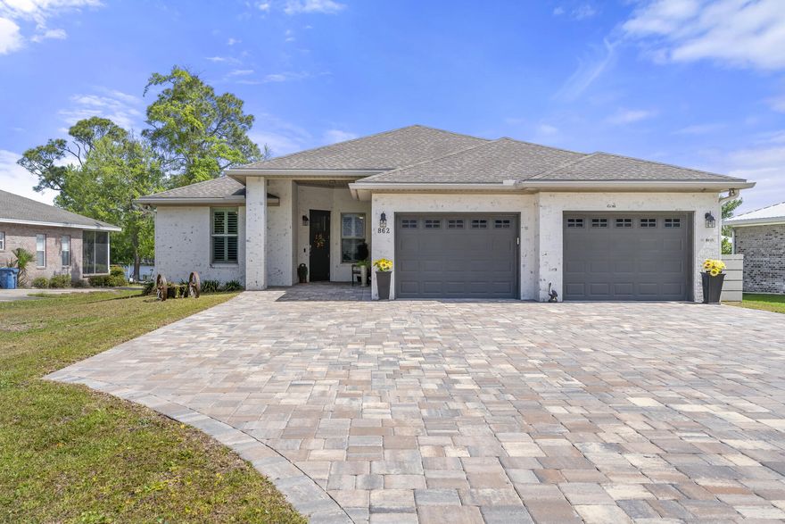 This stunning 2015 built, FURNISHED Bayfront home, with 2164 Sq. Ft., is a true masterpiece! With 81 feet of direct access, this single-level Brick residence offers great views, 4 bedrooms, 2.5 bathrooms, a private office, Pool, Hot tub & MORE!The property features a private dock, covered boat lift & deep- water access. You'll love the expansive swimming pool with a tanning shelf. Unwind in the 6-person hot tub, watch the outdoor TV, or hang out under the large covered porch in the bed swing.The outdoor kitchen is a dream! It includes a Green Egg, large griddle, beverage fridge, ice machine, bar stools, & granite countertops. There's also a built-in firepit with Adirondack chairs.Inside, the chef's kitchen is outfitted with stainless steel appliances, ample cabinet & counter space, smooth top stove, double-door fridge, & a walk-in pantry. The adjacent dining area offers seating for 8 & the den features reclining faux leather furniture & a large TV mounted in a large entertainment center.
The primary suite boasts water views and a bathroom with dual sinks, soaking tub & a shower with seating. There are also 3 additional bedrooms, a hall bathroom with dual sinks, shower/tub combination, along with a linen closet.
The private office is appointed with an ornate wood desk, matching credenza, filing cabinet & chair.
Additional amenities include a two-car garage, attic space, security system, irrigation system, fenced in Backyard & no HOA!
This FURNISHED Bayfront gem is truly one-of-a-kind! Don't miss out on the opportunity to make it yours! 
ROOM AND LOT SIZES HAVE BEEN ESTIMATED.  FURNISHINGS INCLUDED EXCEPT FOR GUN SAFE & PERSONAL BELONGINGS. OWNER IS A FLORIDA LICENSED REALTOR. SOME FURNITURE MAY CHANGE.
