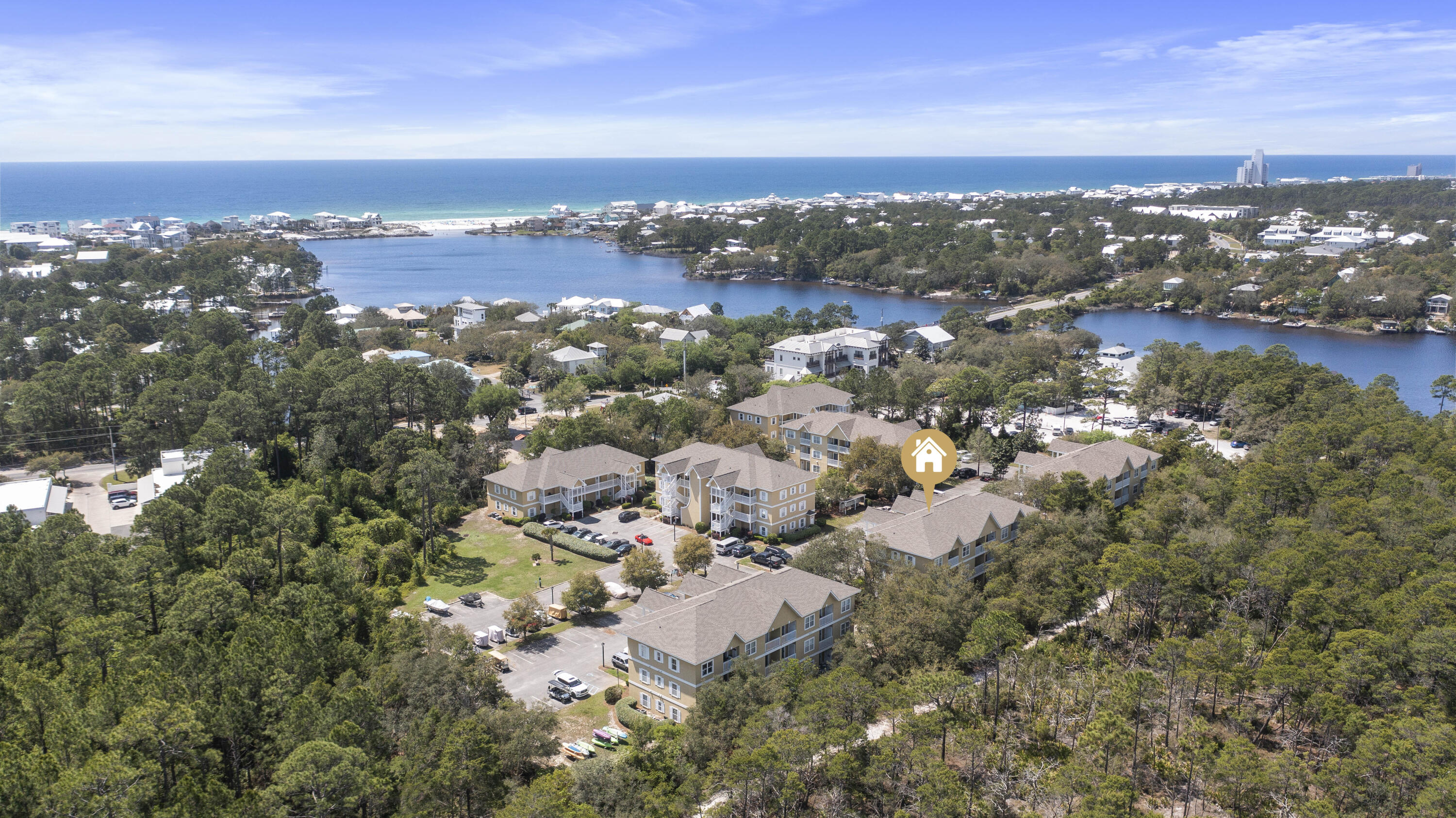 Amazing opportunity to own an updated 2br condo in Seagrove Beach for an incredible value. This unit is located on the top floor enabling it to have nice & airy vaulted ceilings in the living area. Unit has been updated with fresh paint & new 6'' baseboards throughout, new stainless appliances, shiplap under bar, new flooring in bedrooms, new lights & fans throughout, and new sink fixtures & toilets. Heron's Watch is a gated, lower density, relaxed condominium backing up to Point Washington State Forest & offers deeded access to Eastern Lake - a rare coastal dune lake that merges towards the Gulf of Mexico. Enjoy kayaking, paddle boarding and fishing from the community dock and paddle directly to the beach! You also have a public beach access nearby just over a mile away on S Gulf Street. This 2-bedroom, 2-bath condo offers serene views of the state forest from the master bedroom and the balcony. Old Florida Fish House, an area favorite for dining & entertainment is right next door. There is also Beachy Bean coffee shop and Coastside Beer & Wine.
Interior doesn't have any carpet so it's easy maintenance for beach living. Kitchen features granite countertops, ample cabinets and new stainless steel appliances. The shiplap accent under the breakfast bar is a nice contemporary touch. The granite breakfast bar is great for casual dining and there is room for another dining table as well. The open living area is a spacious with the vaulted ceilings and has direct access to a fantastic balcony that overlooks natural pines and foliage. Connect to state park trails right behind you. There is a storage closet on the balcony that is ideal for all of your beach & outdoor gear to enjoy coastal living on 30A. The master bedroom is generously sized and features new luxury vinyl flooring. There are two large windows bringing in great natural light and forest views. Master bedroom has an ensuite bathroom for convenience with shower/tub combo. A split floor plan allows privacy for the master and guest bedroom. The guest room is by the entry and also offers the new flooring. There is a full guest bathroom and laundry room with stackable washer/dryer. The community offers a golf cart charging station and kayak & paddle board store right by building 7. There is also extra parking for boats and a boat launch nearby on Lakewood & Lakeview Drive. This is an ideal second home or vacation rental for the water enthusiast. The covered front porch is a nice area to relax and great guests. This unit was previously used as a long term rental, however, you can rent short term. Projection is $65k annual gross income if you were to include a golf cart. This is a great cash flow opportunity for an ideal location in Seagrove Beach.
Seagrove is nestled between three state parks (Grayton Beach State Park, Point Washington State Forest, and Deer Lake State Park) so the natural beauty is endless! Seagrove offers tons of outdoor recreational activities such as kayaking, canoeing, boating, fishing, hiking, paddle boarding, bird watching and cycling. While Seagrove definitely has a small town charm, it also has a luxurious side to it with premier dining, boutique shopping, art galleries, art festivals, outdoor concerts, bike paths, and is neighbors with the upscale neighboring communities of Seaside & Watersound. These units do not come on the market often, don't miss this incredible opportunity to see what makes this unit such a great rental investment, vacation retreat, or a full-time residence too as there is a nice community of full time owners. Especially with all the new updates, this is a steal!
