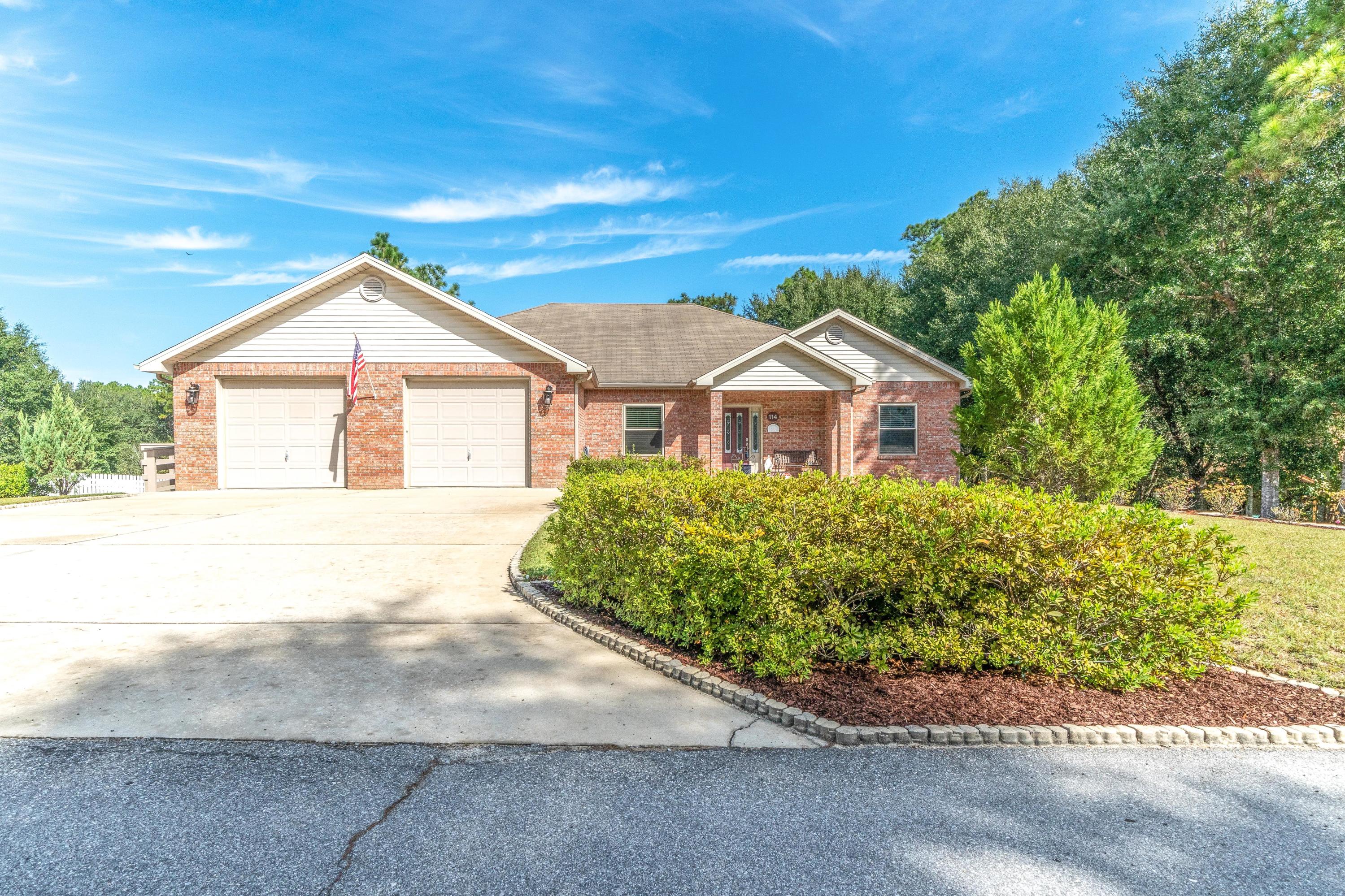 South Crestview ONE OWNER custom home on large lot with room for a pool! Walkout basement is an AWESOME workshop and storm shelter! This well maintained quality built home features an adaptable floor plan with 3 bedrooms plus a den and Bonus Room (possible 4th bd), HUGE kitchen with center island and large walk in pantry, oversized utility room, 3 spacious Full bathrooms. Stunning hardwood floors in the entry, dining, and great rooms, an oversized master suite with tray ceiling and HUGE master bath! The backyard deck and views are amazing. The well thought out design features a mother in law bedroom/bath perfect for someone with accessibility needs. There are so many possibilities! Plenty of room for your boat or RV! Easy commute to area military bases and close to everything