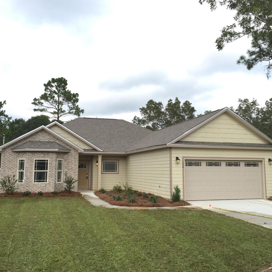 Location Location Location! Walk to CHS,Davidson ,banks ,Movies, Restruants and Winn Dixie! New Home Large lot ! 3 Bedroom, 2 Bath home with many upgrades! Granite counter tops in both the kitchen and bathrooms. Cathedral ceilings with wood cielings. Laminate wood floors,tile in the bathrooms! Hard plank siding shaker gables! Tile shower with claw tub in the master bathroom! Under construction. Irrigated lawn! Come home today! Local custom builder. See document section for floor plan!