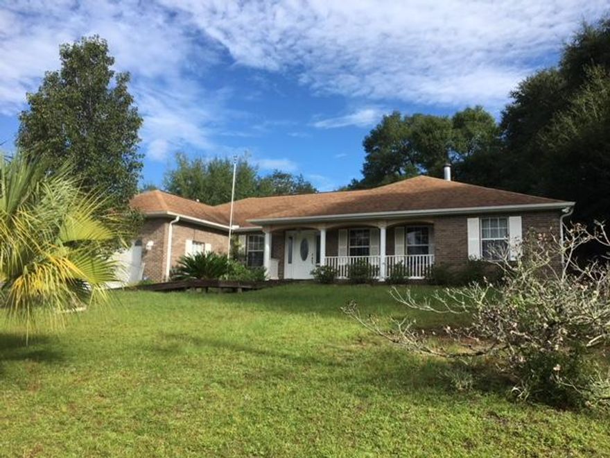 Great 3/2 In the established Indian Trails Sub-div. Close to everything with that elusive tucked out of the way location.New Carpeting and flooring in Bedrooms and master Bath.In ground Pool, whole house generator, great floor plan, Private, fenced-in back yard with room to garden. rare protected Gopher Tortoise living on premise.A Great place to live.