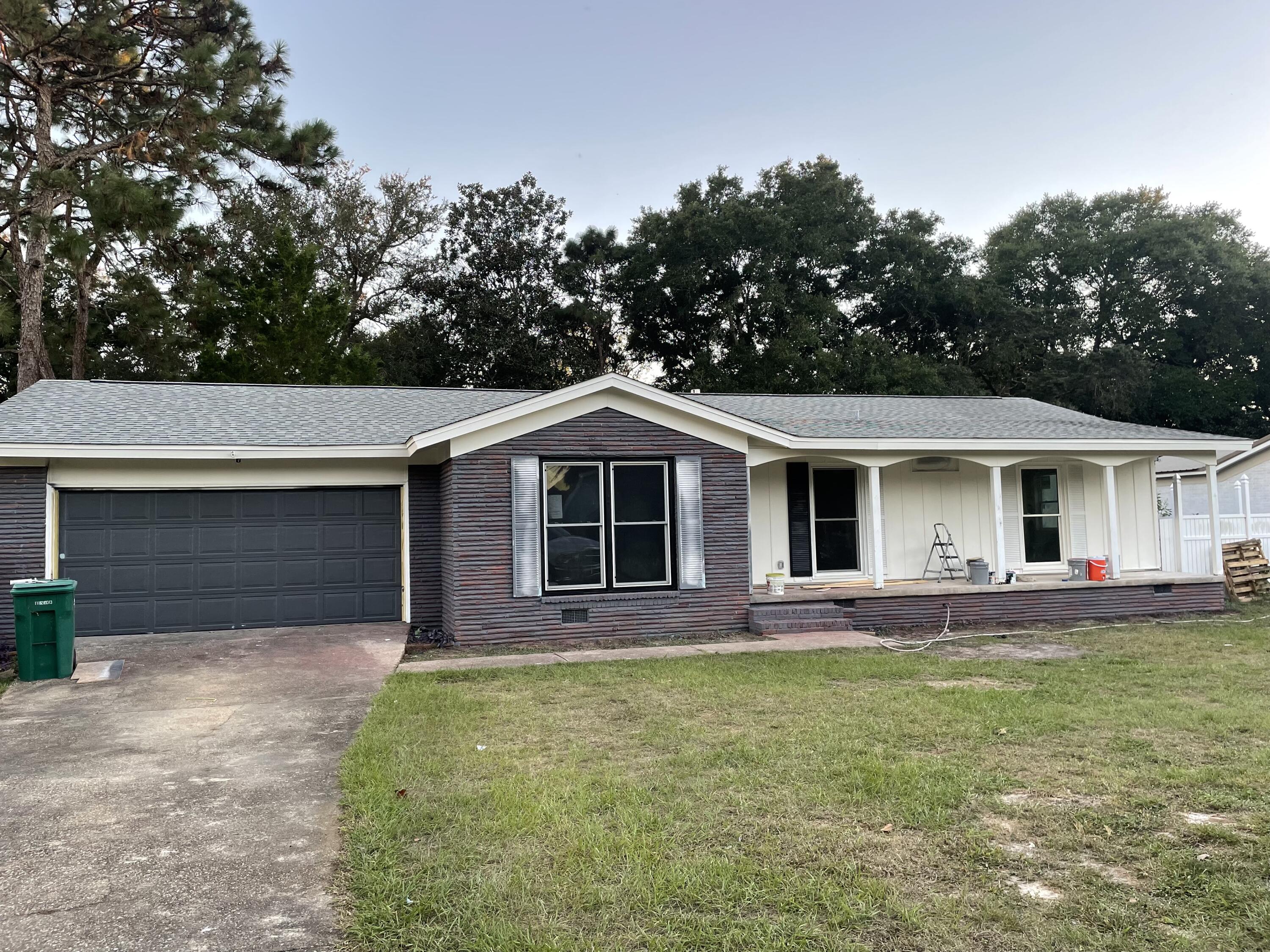 Pre-Sold! Home has been completely renovated on the interior. New LVP flooring through out, new paint, new tiled bathrooms, all new white shaker kitchen cabinets, granite counter tops, and stainless steel appliances. All new lights, new deck out back and fresh exterior paint.