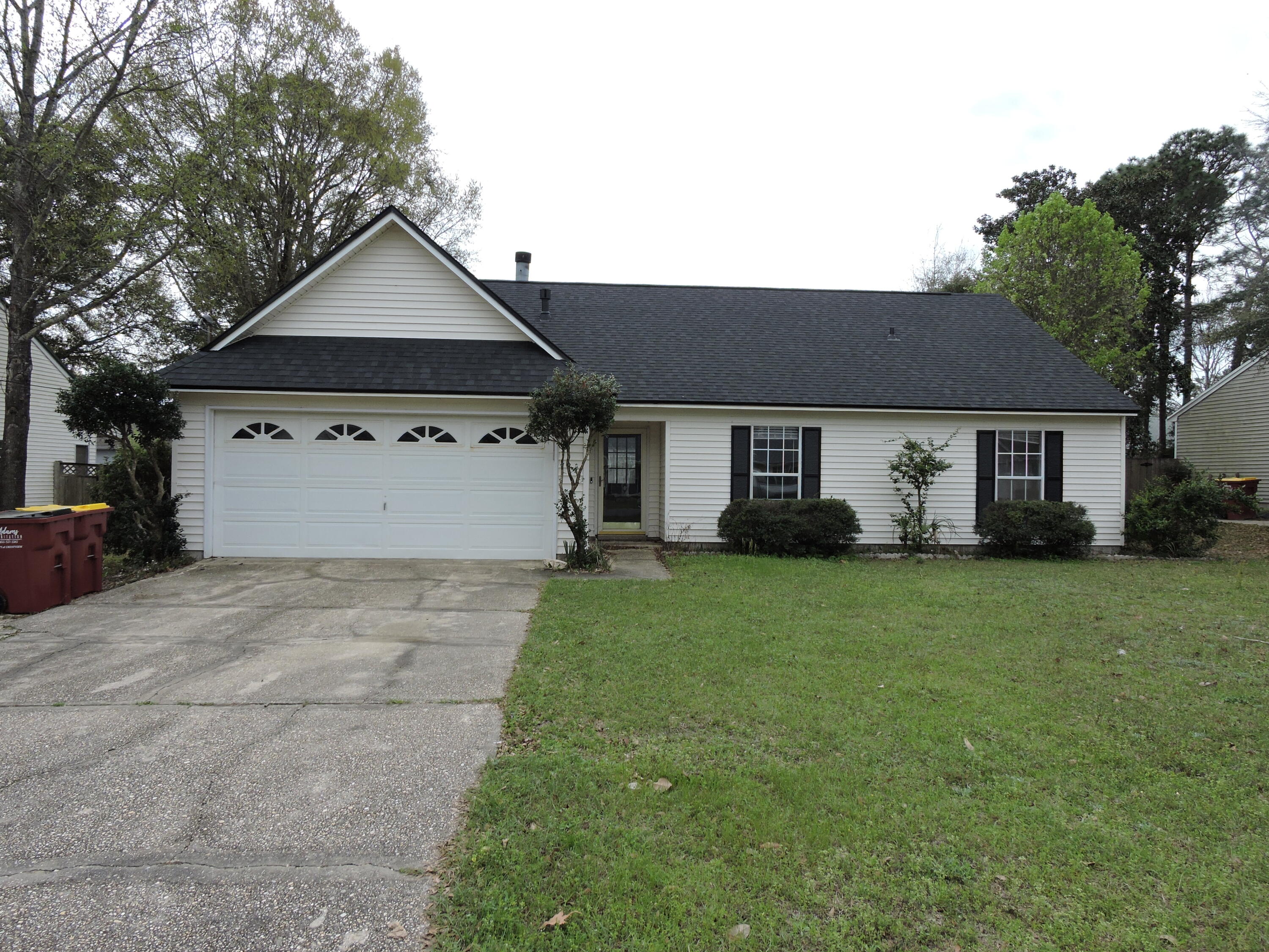 Located South of I-10, freshly panted throughout in agreeable gray walls with white trim. The home has 4 bedrooms/2 baths with 2 car garage. The home welcomes guests with cathedral ceilings in the family room accented with a wood burning fireplace and tile flooring throughout the main floor. The kitchen features ample cabinet and counter space and kitchen island with gas stove. The master suite features large walk in closets and dual vanities. The additional bedrooms are ample sized with nice walk in closets in the down stairs bedrooms. The home has a privacy fenced backyard with small storage building as well. Schedule your private showing today!