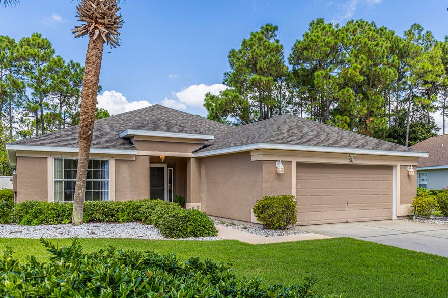 This fantastic one-level home is located in Palmetto Trace, a pristine, non-rental St. Joe community just north of Pier Park and only about three miles from white sandy beaches and the Gulf of Mexico. Offering the best of both worlds, this home allows for peaceful, residential living while being conveniently close to shopping, dining, entertainment, Frank Brown Park, a fishing pier, and two nearby public beach access points--easily reached by golf cart from the community. The property enjoys a premier position within Palmetto Trace, backing up to green space for enhanced privacy & serenity. Sitting on an expansive 0.27-acre lot, the home offers a spacious fenced backyard with mature trees, a garden area, & even fruit trees. The curb appeal is inviting, with a 2-car garage & large driveway. Practical updates include a new roof installed in 2019, HVAC system replaced in 2017, and the home is located in desirable Flood Zone X. Hurricane shutters are also in place for added peace of mind. The interior has just been freshly painted in bright white throughout the main living areas, creating a light, airy feel. Inside, you'll find nearly 2,000 square feet of well-designed living space with a split floor plan ideal for privacy. The open living area features vaulted ceilings and great natural light. There's a cozy family room and an impressive Florida room at the rear of the home, offering beautiful views of the backyard and direct access from both the main living area and the primary bedroom. This space also includes an additional refrigerator, making it perfect for entertaining. Just off the Florida room is an open-air patio, ideal for grilling and enjoying the peaceful outdoor setting. The kitchen is both functional and stylish with granite countertops, a breakfast bar, stainless steel appliances, plentiful cabinetry, and a pantry. The adjacent dining area offers easy flow into the main living spaces, making it great for gatherings or everyday meals. The primary bedroom is generously sized and overlooks the private backyard. The ensuite bathroom offers a true retreat, complete with a large soaking tub, double vanity, walk-in shower, and walk-in closet. On the opposite side of the home, two additional bedrooms share a well-appointed guest bathroom. The laundry room includes a full-size washer and dryer that convey with the home, along with extra storage, and it connects directly to the two-car garage. Palmetto Trace residents enjoy access to two community pools, beautifully maintained walking trails, and two convenient entrances. The location is unbeatable, with Top Golf, Pier Park, Frank Brown Park, SkyWheel, AMC Theatre, Dave & Buster's, and much more just minutes away. Whether you're heading out for a day at the beach, fishing at the pier, or playing pickleball at the park, everything is right at your fingertipsthen come home to your peaceful oasis. This home offers a rare combination of location, privacy, condition, and value. With its larger lot, mature landscaping, recent updates, and ideal layout, it stands out as one of the best opportunities in Palmetto Trace. Don't miss your chance to make it yours!