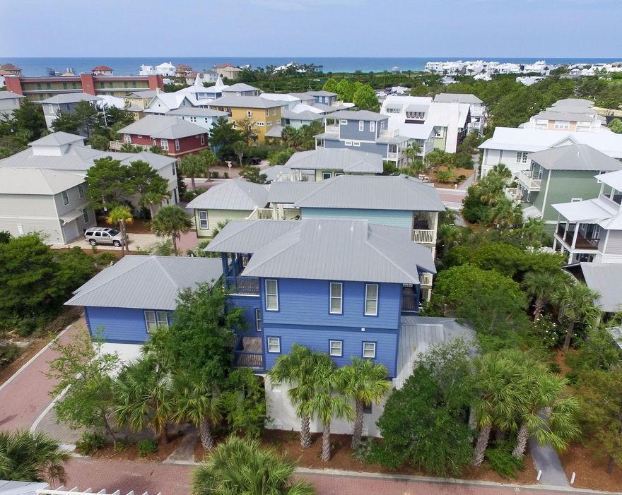 Seacrest Beach is perfectly placed between Rosemary and Alys with its own Town Center restaurants/shops, 12,000 sq. ft. pool and private beach shuttle. This home on Surfer Lane, designed by Tyler Doin, is located on a large corner lot with many upgrades though-out: 3 Wood Plantation Shutters; 10' ceilings on first and third floors; Crown Molding; Cypress wood floors; Travertine; and Granite. The Main House welcomes with a rocking chair front porch, first floor guest bedroom with en-suite bath, Stainless Steel/Granite/ Glass back splash kitchen, and the large living and dining open floor plan is sure to accommodate your family. Designer Furnishing quote and photos available in the Document Section.