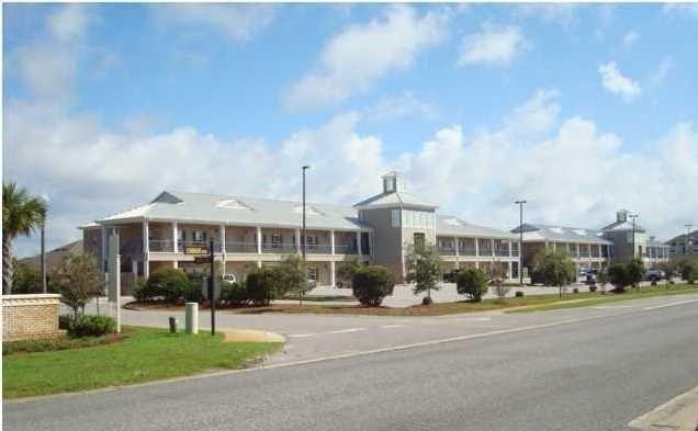 Office unit. Superior construction - structural steel with brick and standing seam metal roof. This executive office space offers an upscale feel with 5 spacious private offices, a reception area, a kitchenette/break area, and a restroom. This office space is also hardwired in each room for data, cable, and phone lines, making it turn key. Located in a high traffic location and centrally located for maximum convenience, this commercial office space also features an elevator, exterior signage and ample lighted parking.