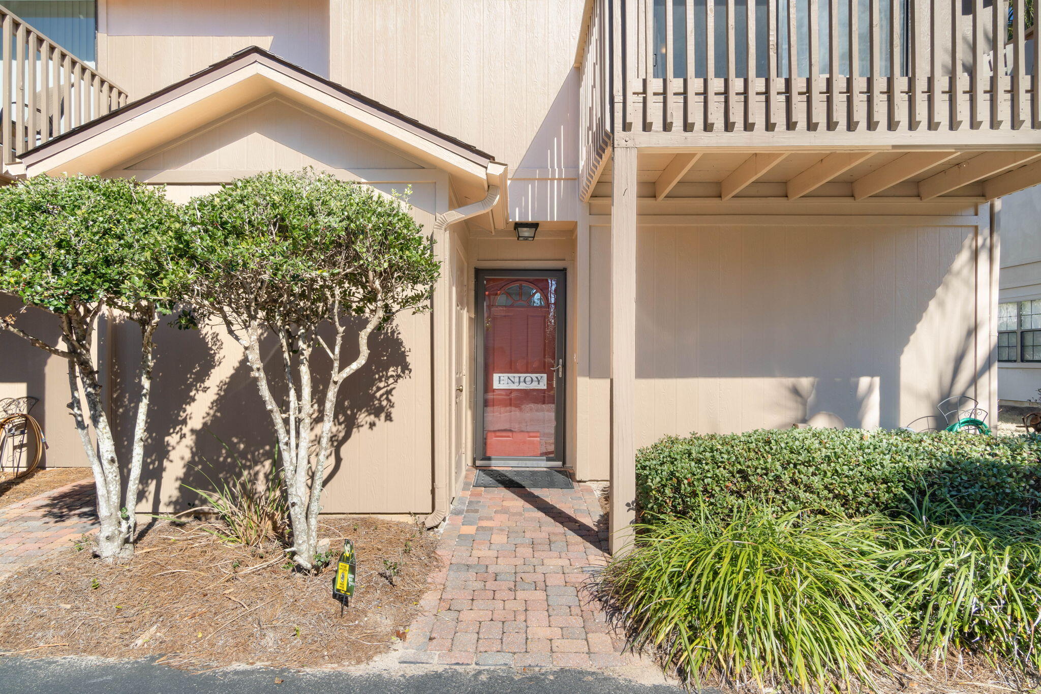 Location Location Location! This 1,252 SF corner unit is across the street from the white sand beach and emerald waters of the Gulf. Located right on 30A, you're within walking distance of shops, restaurants, and so much more!This rare corner unit features a half bath for guests! Only corner units have a 1/2 bath feature. Meticulously cared for with private balconies for each bedroom for those quiet mornings with a cup of coffee amidst nature. Want to go for a swim, the pool is just steps away from the backdoor! Cassine Gardens  property line backs up to Point Washington State Forest, which gives you access to the hiking trails steps away away from your door.  Cassine Garden also features a second pool, grills, and a  stocked fishing pond for those leisurely afternoons.