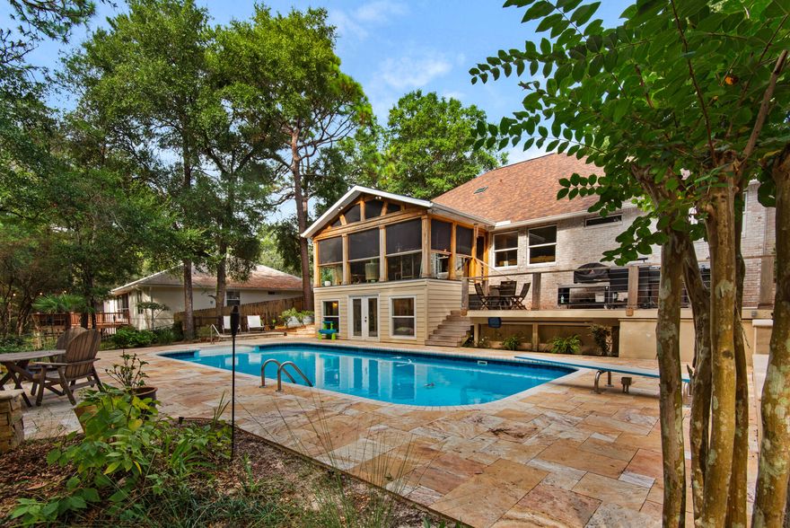 Are you looking for a beautiful home in which to make wonderful memories? 2181 Chase Drive has everything you could possibly need to make that happen. From the moment you approach the property - it is hard not to take in the beautifully landscaped yard and curb appeal of this home. When you see the beautiful paver driveway, brand new 2025 roof, fresh paint and the gorgeous custom double wood front doors you will be definitely want to see more. Stepping into the home you are greeted by hard wood floors and an impressive vaulted ceiling in the living area.  Large windows throughout the home bring tons of natural light in every space. This chef's kitchen boasts a sub zero refrigerator, gas cooktop/oven and bar counter for those who want to keep you company while the chef of the family cooks. The luxurious master bath has been completely remodeled with a gorgeous soaker tub, walk-in shower, custom built-in vanities, custom master closet, and heated floors make getting ready a pleasant experience for sure. Upstairs has three more bedrooms, a full bath and an open loft which overlooks the living area. Back downstairs - open the triple sliders into the relaxing and impressive screened/glassed back porch which overlooks the pool -  the wood finishes, gas lanterns, a gas fireplace and the privacy of the wooded back yard give this room a cozy, elevated feel. Or, if you prefer to sit outside - the large deck will accommodate the whole family.  There is room for a jacuzzi, an outdoor kitchen and is perfect for entertaining. The 18x38 pool has travertine decking and is such a beautiful focal point in the backyard. There are several areas to relax around the pool and enjoy your peaceful surroundings. There is a green space behind this property - so no backyard neighbors! Don't miss the almost 300 sqft of heated and cooled space under the porch...so many uses for this area - it could be an office, fantastic homeschool space or pool hang out area. Items of note: Roof 2025, HVAC 2022, 2011 tankless water heater and whole house generator.