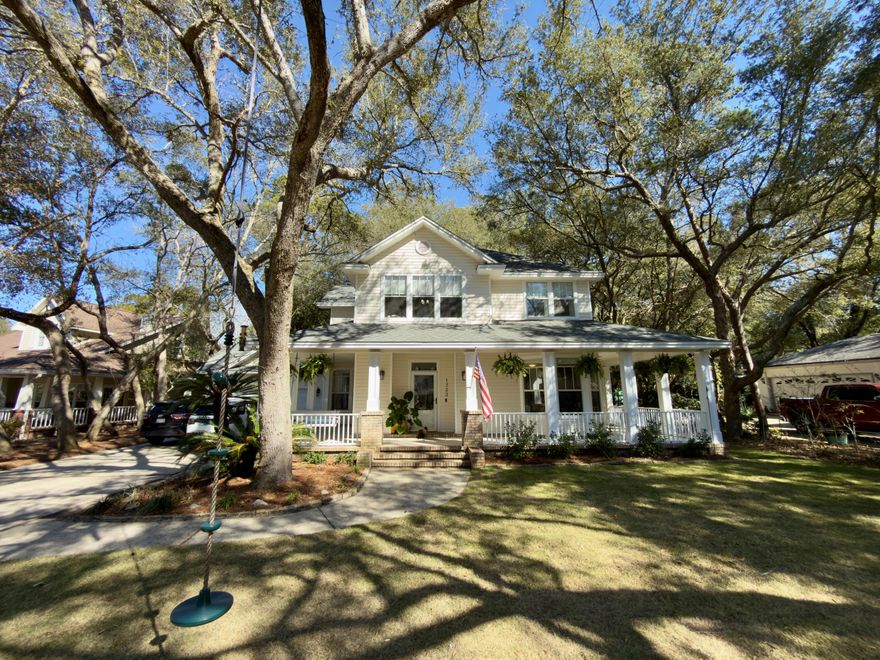 Welcome to this truly unique and eye-catching residence nestled in the Village of Bolton within the gated community of Parkwood Estates. From the moment you arrive, the wrap-around porch steals the show--brimming with charm and offering the perfect spot to sip morning coffee, wave to neighbors, or unwind in the coastal breeze.This home has been meticulously maintained with significant mechanical investments:Water Heater: New 2026HVAC & Ductwork: New 2024Roof: Installed 2022Interior: Freshly remodeled kitchen and updated luxury finishes throughout.Inside high ceilings, crown molding, wainscoting, and deep window casings lend a sense of timeless character. Remodeled kitchen with new quartz countertops, contemporary hardware, stylish lighting, and stainless steel appliances.  An adjacent nook with extra shelving is perfect for entertaining with access to the screened porch and backyard. 
Inviting Family Room: Features a cozy gas fireplace flanked by custom built-in cabinets and shelving. A stunning staircase leads to a landing featuring floor-to-ceiling built-in bookshelves. Located for privacy the primary suite with deep-cased windows and new fixtures. The ensuite is a spa-like haven with new flooring, a new double vanity with quartz counters, and modern faucets. The additional upstairs bedrooms share a beautifully updated bathroom featuring a new quartz-topped vanity. Transition seamlessly to the outdoors via the screened-in porch or the expansive wrap-around deck. The private, fenced backyard includes an additional deck off the utility room and plenty of green space to play. Maintenance is a breeze thanks to the dedicated lawn pump and sprinkler system. For the hobbyist or organized homeowner, the garage features a large attic storage space above.
