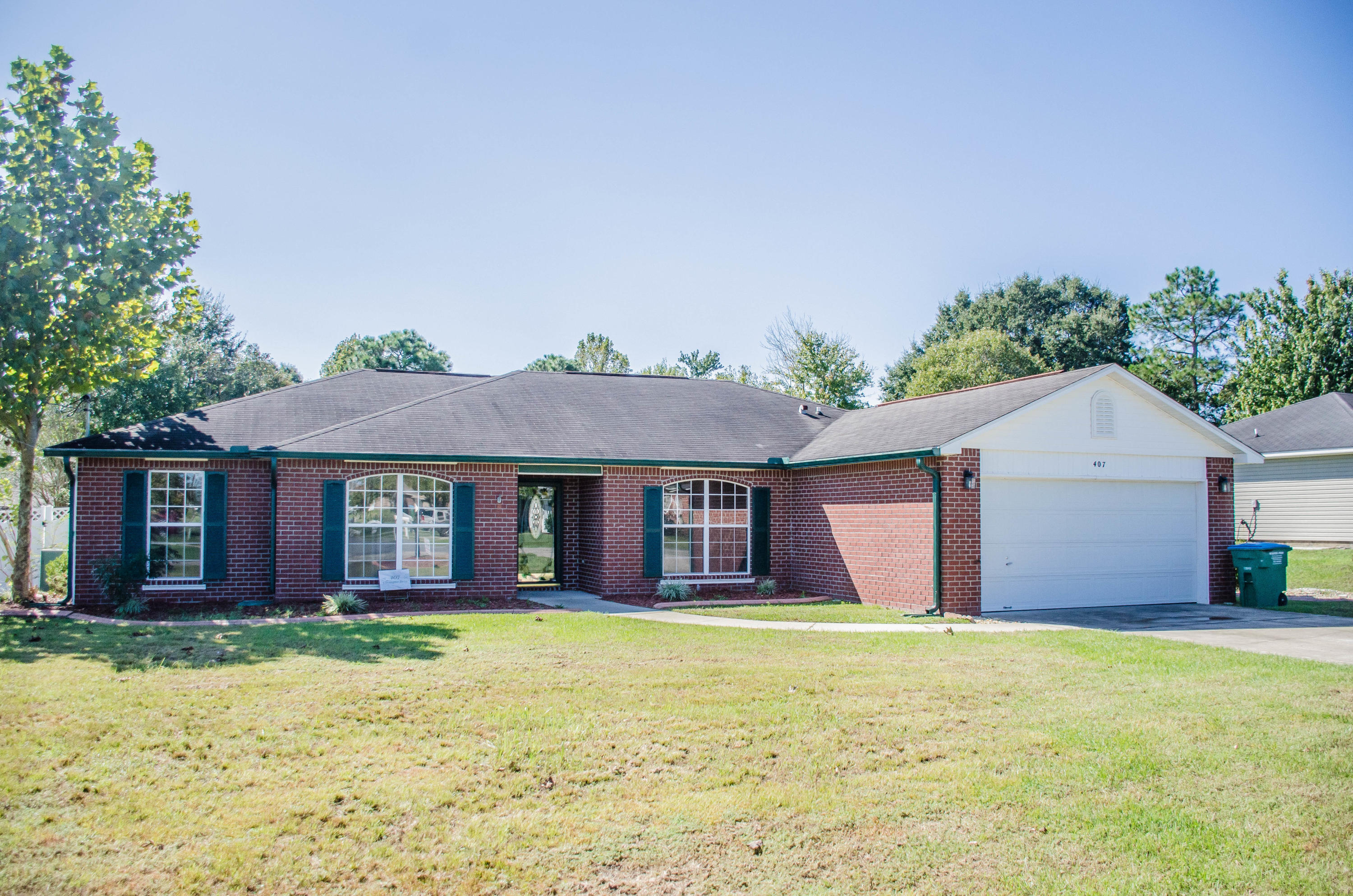 Great South Crestview location on this 4 bedroom and 2 bath home on over a quarter acre lot with your very own pool!!! Home has been freshly painted (walls and trim, to include doors). Wood laminate floors are featured throughout the home with the exception of tile in the wet areas. Split bedroom design for family privacy. Kitchen features updated cabinetry and solid surface counter-tops as well as stainless steel appliances. Smooth top range/oven. Master bedroom is very spacious and bright and master bath is roomy with a large walk-in closet. Cap it all off with an in-ground pool which has a new pump and filter installed this Summer. Don't miss out on this south Crestview gem, make an appointment to see it today!