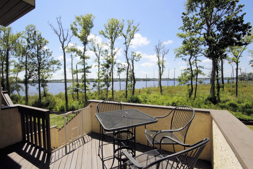 Live your waterfront dreams the carefree way in the Marina Cove Townhomes overlooking Rocky Bayou. The association takes care of the yard maintenance so all you have to do is sit back and enjoy. If you are a boater, you can keep your boat at the Bluewater Bay Marina, just a short walk away. If you like to fish, you can stroll down to the community dock and fish all day. After your day of boating or fishing, you will enjoy coming home to your completely renovated townhome. Recent renovations include a remodeled kitchen with granite counters and stainless appliances and tile floors that look like hardwood. This is a multi level unit with the garage at the ground level, two living levels and two bedroom levels so it is great for multi family living! Time to live your waterfront dream!!