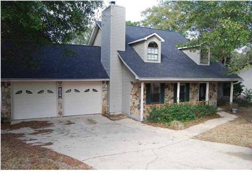 WATERFRONT HOME IN ROCKY BAYOU: TWO STORY HOME WITH THE MASTER SUITE AND BATH DOWNSTAIRS, HUGE KITCHEN AND DINING AREA, CENTER ISLAND AND PLENTY OF CABINETS, LARGE LIVING ROOM WITH A COFFERED CEILING AND FIREPLACE,PLUS A GUEST HALF BATH. UPSTAIRS FEATURES 2 GOOD SIZE BEDROOMS AND PLENTY OF STORAGE. EXTRA LARGE DECK ON THE BACK OF THE HOME, GREAT FOR ENTERTAINING OR JUST PLAIN RELAXING WITH A VIEW OF THE WATER. ROOF HAS RECENTLY BEEN REPLACED AND TWO HEAT AND AC UNITS ONE FOR THE DOWNSTAIRS AND ONE FOR THE UPSTAIRS. NICE LOT WITH PLENTY OF SHADE TREES, SPRINKLER SYSTEM FROM THE CANAL AND A LARGE TWO CAR GARAGE. ALSO INCLUDED IS A GOOD SIZE DOCK GREAT FOR A SMALL BOAT FOR FISHING.SELLER SAID BRING AN OFFER READY TO SELL!!!