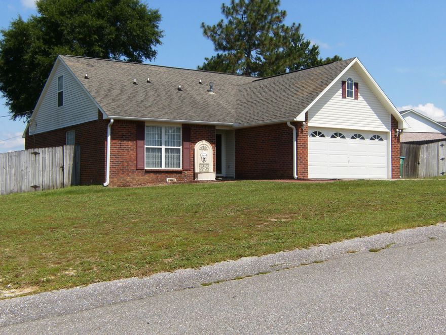 SOUTH OF I-10 ON LARGE CORNER LOT~ 4 BEDROOM, 2 1/2 BATH BRICK HOME~ KITCHEN HAS BEEN UPDATED WITH CHERRY CABINETS, SOLID SURFACE COUNTER TOPS WITH UNDER COUNTER SINK~ BREAFAST ROOM, KITCHEN AND LAUNDRY ROOM IS TILED~ MASTER BEDROOM AND 1 ADDITIONAL BEDROOM DOWNSTAIRS WITH 2 ADDITIONAL BEDROOMS UPSTAIRS WITH SMALL MEDIA AREA~ MASTER BATH HAS DOUBLE VANITIES WITH GARDEN TUB & SEPARATE SHOWER~ LARGE LIVING ROOM WITH FIREPLACE AND LARGE GLASS SLIDING DOORS OPENING ONTO LARGE PATIO IN LARGE PRIVACY FENCED BACK YARD~ FORMAL DINING ROOM OPENS TO LIVING ROOM~ New ROOF INSTALLED AUGUST 2017~ Don't let this one pass you by~ Being sold as is~