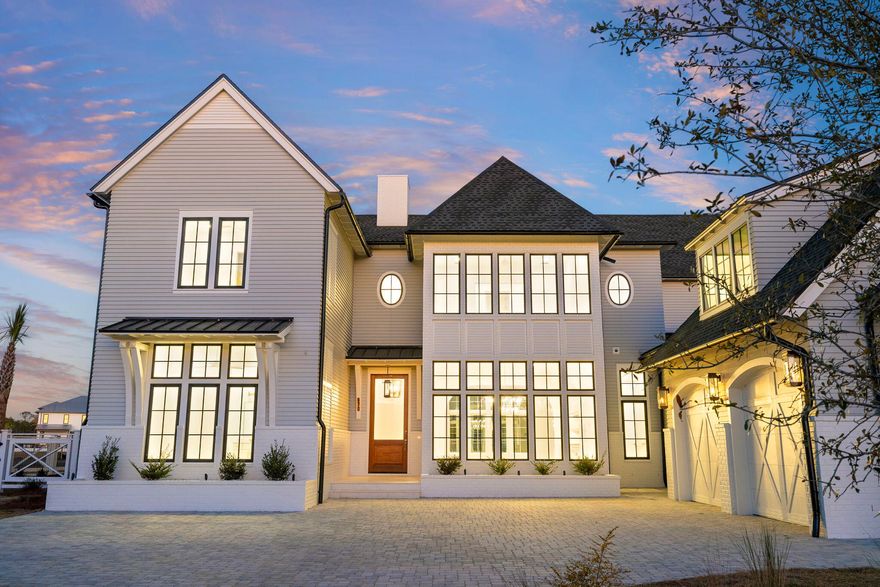 Tucked inside Watersound Camp Creek, this newly constructed estate deliver 6,343 square feet of refined coastal living. With six bedrooms, seven full baths, and two half baths, the layout is expansive yet intentional, designed for both privacy and effortless entertaining.Soaring ceilings and natural light define the interiors. Venetian plaster walls, clean architectural lines, and carefully selected finishes create a timeless aesthetic. The kitchen is finished with custom cabinetry, professional grade appliances, Taj Mahal quartzite countertops, and hand made Moroccan tile that adds depth and texture. A separate scullery keeps preparation and storage discreet, while a well designed mud room adds everyday functionality without sacrificing design. Two full laundry rooms, one on each level, further support long term livability for owners and guests.

The home enjoys golf course views from the front, creating an open and distinguished arrival, while the backyard backs to a large pond, offering privacy and a peaceful water backdrop. The covered lanai, fully equipped outdoor kitchen, resort style pool and spa, fireplace, and mature Sylvester palms create a true extension of the living space.

The two and a half car garage provides ample space for vehicles, golf carts, and beach gear.

Ownership includes access to the Watersound Club, one of the most comprehensive private club experiences along 30A. Amenities include a 6,500 square foot zero entry pool, a 270 foot lazy river, wellness center, eight Har Tru clay tennis courts, eight pickleball courts, a dedicated adult pool, and multiple dining venues. Golf access includes Camp Creek Golf Course designed by Tom Fazio, along with Sharks Tooth and The Third. The Watersound Beach Club offers over a mile of private beach frontage with full service chair and umbrella setup and coastal dining.

Positioned just off Scenic Highway 30A, the home offers privacy while remaining minutes from dining, boutique retail, scenic trails, and championship golf.

This is a thoughtfully executed coastal estate inside one of the most desirable club communities on the Emerald Coast.