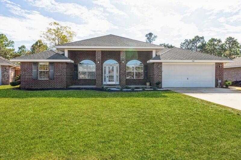 Come home to your very own piece of paradise in NW Florida!  This gorgeous Adams built home situated on a very quiet double cul-de-sac features an all brick split floor plan with covered front & back porches! Master suite features tray ceiling, double vanities, garden tub, separate shower & double walk-in closets. Open kitchen has new and/or newer appliances, large pantry and breakfast bar overlooking your family room with wood burning fireplace. Doors from the family room, master bedroom and additional bedroom all lead to your covered patio where you can relax with a cup of coffee while enjoying all of the gorgeous green space just past your privacy fenced back yard,*New refrigerator and dishwasher*Hot Water Heater 2022