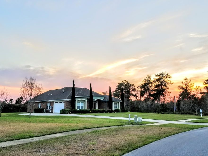 Perfectly designed inside and out this home offers relaxing living in a quiet setting on an oversized lot. Sitting on almost an acre land this property has plenty of room for a custom pool or a guest house. Included in the sale are a large 16X12 wood framed shed, custom brick Fire pit in the back yard, beautiful Swing as well as a Home warranty provided by the owner. Walk through the elegant entrance and foyer into the inviting atmosphere of the living room and formal dining. Absolute dream kitchen features granite tops, tile backsplash, pullout lower cabinets, breakfast bar, SS appliances and additional dining area. The family room has a cozy fireplace and custom built-in bookshelves. Step through the french doors into relaxing private outdoor retreat. Highlights include split floor plan