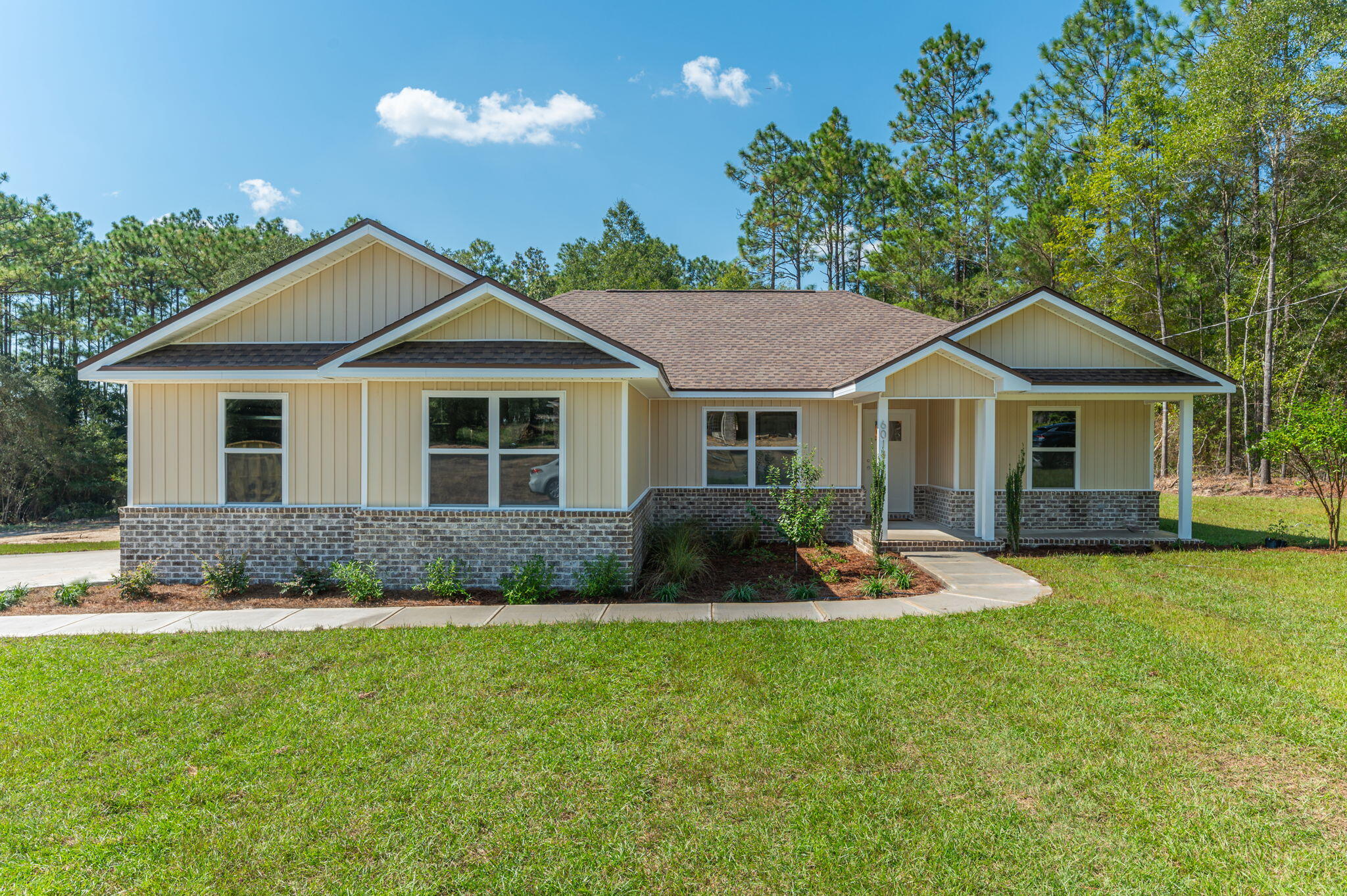 This gorgeous Craftsman style home in Crestview is complete and looking for a family to call HOME. If you like all things new and want a local builder who takes a custom approach on finishing touches this home is the one for you. The builder is offering a 10k closing cost credit with an acceptable offer plus a $1400 lender credit with preferred lender. A few of my favorite features outside include the side entry garage, large front porch, gorgeous landscape package and a .64 acre lot. If the outside doesn't have you sold the inside will. Upon entering into the home you will be greeted with Lvp flooring in the main living/wet areas, upgraded lighting package throughout the home, high vaulted ceiling in the living area, cased out windows, and gorgeous cabinetry/counter tops to name a few