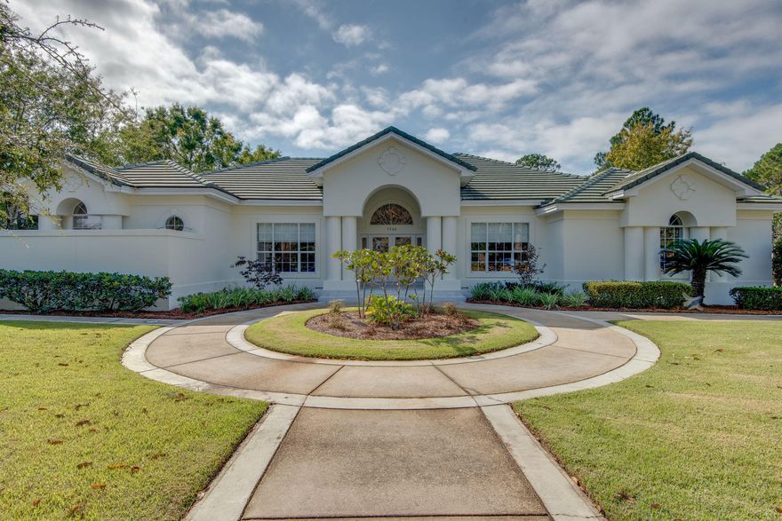 Lake front, Immaculate 3 bedroom 3 bath home across from the golf course in the desirable Troon Dr Community. From the professional decor to the quality of the furnishings, you will be blown away! The beautiful windows and lake view will take your breath away when you walk through the front door. This home is exquisite and has been meticulously decorated and maintained. An added bonus is that the beautiful furnishings will convey with the sale! The kitchen is fully equipped with matching Kitchen Aid appliances including a Gas Range and lovely stone countertops. The bedrooms are roomy and tastefully done. The two living areas have stunning lalkeviews. Your buyers will not be disappointed in this home! All measurements are approximates and should be verified by the buyer.