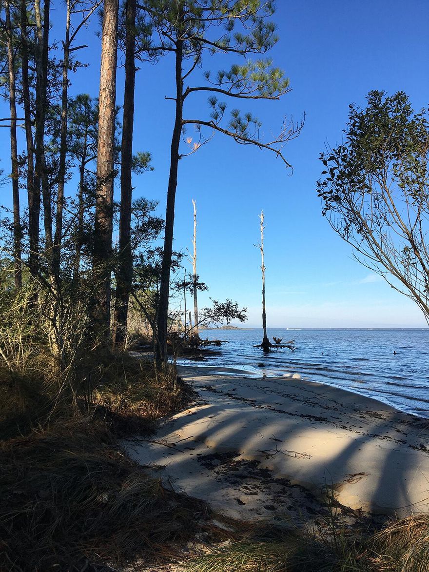 Lots like this are getting harder to come by!  Wont last! Located just 3.4 miles to Ed Walline Beach Access and the beautiful Gulf of Mexico! This lot is a quick drive to the beach,and Gulf Place shopping and dining.  Cesna Landing boat launch is only .5 miles! away and the 393 boat ramp access on the bay is 1.9 miles away! Bring your boat and build a beach house get away!  This lot is already cleared and sewer and city water are available on Central 6th.  No HOA!