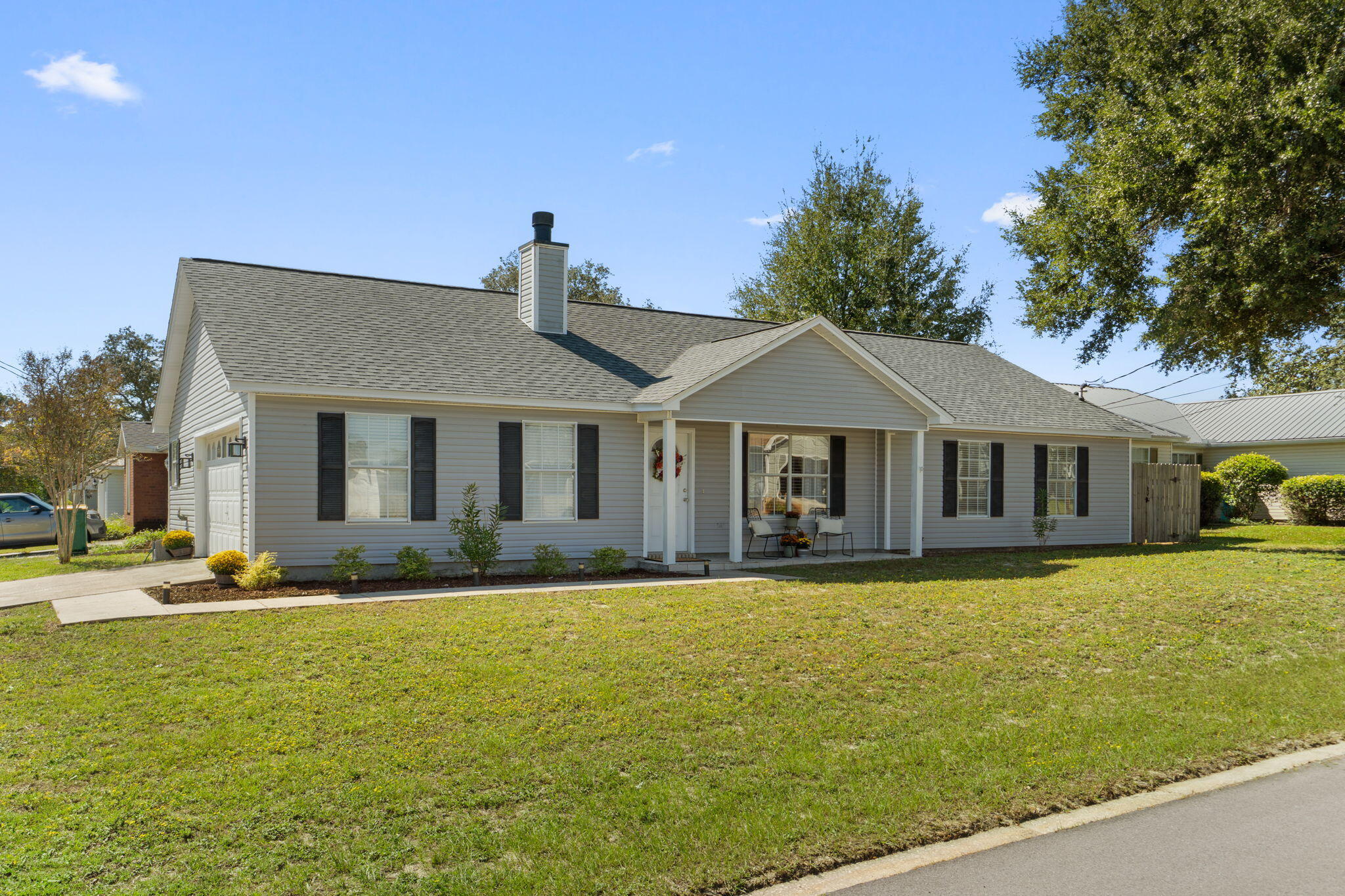 Welcome home to this delightfully updated 3 bedroom, 2 bath ranch in a prime Fort Walton Beach location and close to everything you want and need! Situated on a corner lot with no HOA, this property offers not only convenience, but also peace of mind with a new roof (2024), HVAC (2022), and water heater (2016).Enjoy an open floor plan ideal for entertaining, featuring a spacious living room with a decorative fireplace, high trey ceiling, and recessed lighting all seamlessly connected to a dining area for easy flow.The well designed kitchen includes a large hop up breakfast bar, walk-in pantry, and ample cabinet and counter space. Tile flooring extends through all common areas, while the bedrooms feature luxury vinyl plank flooring for comfort and style.The primary suite easily accommodates a king sized bed and features a tray ceiling with crown molding, a walk-in closet, and an en suite bathroom with an extended vanity, walk-in shower, and linen closet.
Additional highlights include no popcorn ceilings, updated ceiling fans in every bedroom, and a large indoor laundry room with a sink (currently spacious enough to double as a home office!). The two-car garage provides windows for natural light and plenty of storage space with its side entry access.
This home truly speaks for itself, schedule your showing today!