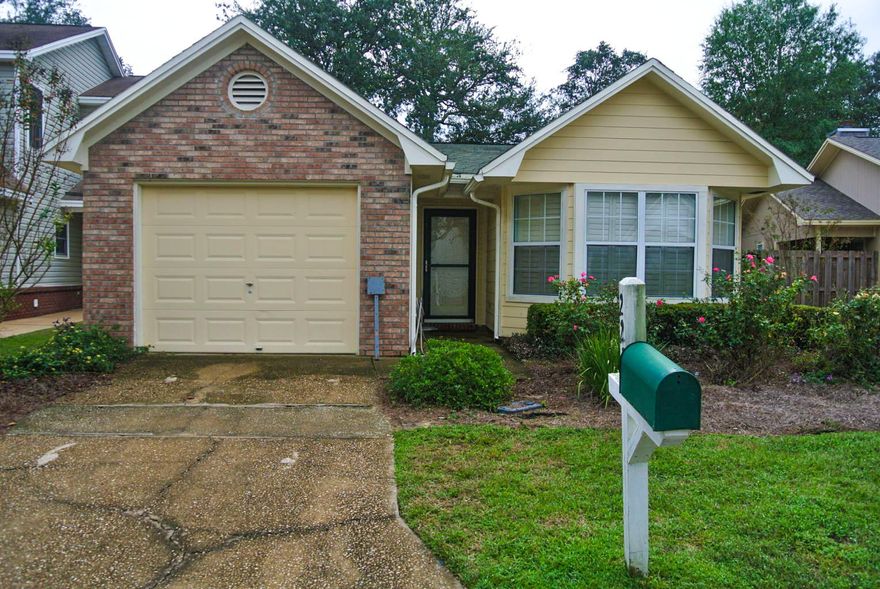 Cozy and well designed Bluewater Bay home. This intimate retreat offers 3 bedrooms and 2 full baths with an open concept floor plan. Featuring tile floors in the main living areas, laminate wood floors in the bedrooms, a nice fireplace with brick hearth, and an outdoor garden area, this home is a must see. Home is within walking distance to Bluewater Bay Elementary, shopping and amenities.
