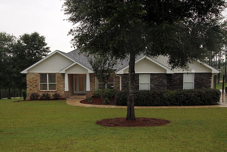 Custom home is in the desirable Silver Oaks subdivision. The inviting exterior features stacked stone, stucco gables, and antique old Chicago style brick. Home sits on an oversized lot just shy of an acre. This 4 bed 3 bath home boasts a custom kitchen with granite countertops, birch cabinets, stainless steel appliances, walk-in pantry, and pod lighting. Open floor plan hosts large family room with 9ft ceilings, 5 inch crown throughout, and a fireplace. Master suite features French doors, wood floor, dual quartz vanity, whirlpool, and tile shower. Split bedroom floor plan offers private guest rooms with Jack-n-Jill bath. Home also offers a flex room, formal dining room with 10ft ceiling and an oversized garage and more. Termite bond is in place. Neighborhood features a pool. Welcome Home!