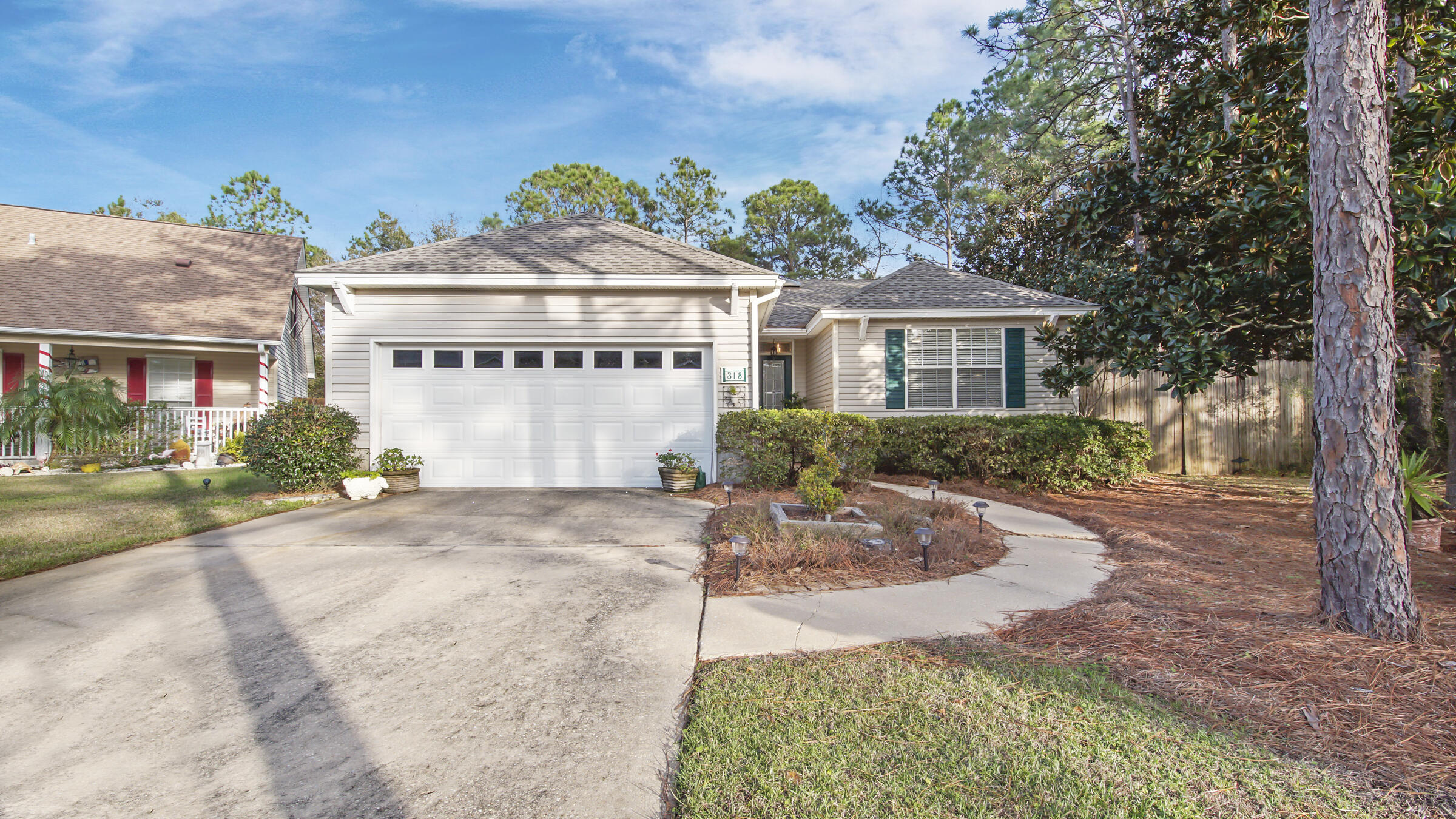 OPEN HOUSE Saturday 1/22 1-4pmThis gated community located on Hwy 393 is sandwiched between water! One mile south to the beach, one mile north to the bay (with boat ramps). A perfect spot to work from home, this one level residence is 5 minutes to Sandestin, 30 minutes to PCB. Hardwood floors in Foyer, Living Room, and Hallway. Fireplace, 2 car garage, Granite countertops in Kitchen & Baths. New A/C -2017, New Frig.- 2020, New Roof-2021. Quiet cul-de-sac, The privacy fenced backyard has a Florida room, and a pergola to enjoy morning coffee while listening to birds sing, or sip wine while stargazing at night. This home is a must see!