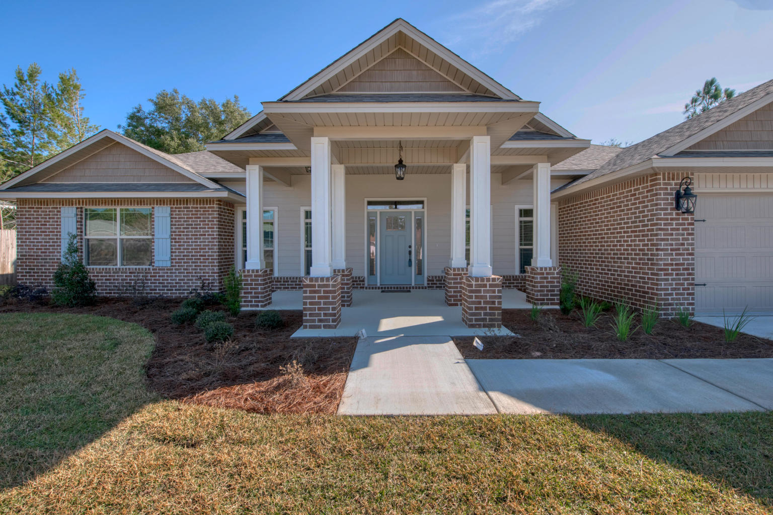 WOW! This is an all brick 5 Bedroom, 3 full Baths, 2757 square foot home in Holley by the Sea. Enjoy all of the amenities of the Club House, pool, tennis courts, gym, game room, waterfront park, access to Santa Rosa Sound and East Bay. This split floor plan home features a spacious great room, formal dining room and a large kitchen with granite counter tops, stainless appliances, smooth top stove, and a built-in microwave, oven and dishwasher. The home has tile floors in all wet areas, hardwood floors in the formal dining room and in the great room. Carpet in all bedrooms. The Master bath features: a large shower, jacuzzi tub, double vanity that is granite, tile floors and two large walk-in closets. There is a 16 x 10 covered porch on the back of this home.