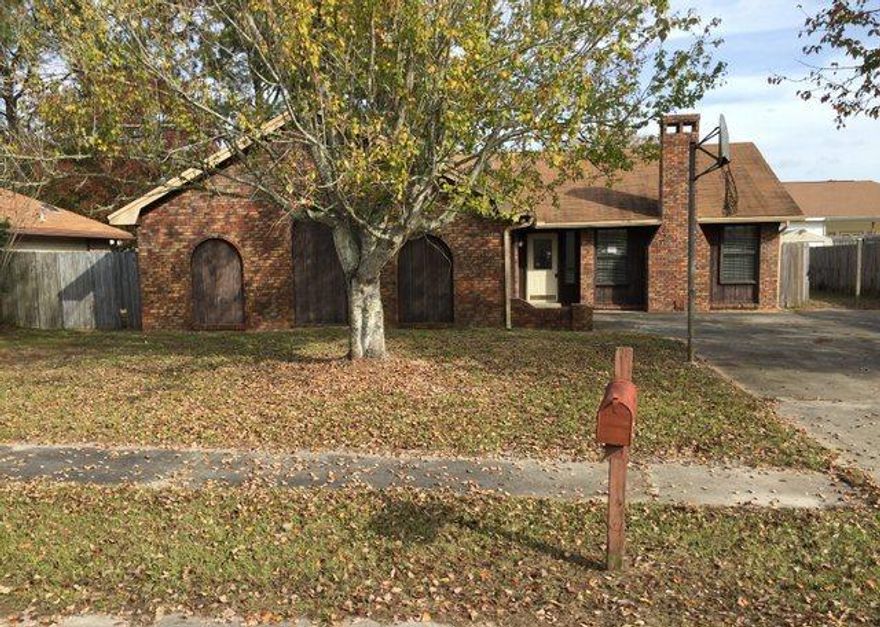 REO ~ All Brick Ranch w/ Lots of Potential! This 3 Bd / 2 Ba ranch offers living room with brick fireplace & vaulted ceilings, separate dining room with laminate wood floors & access to the large fenced back yard. A new A/C is on order! Don't miss out on all this home has to offer.