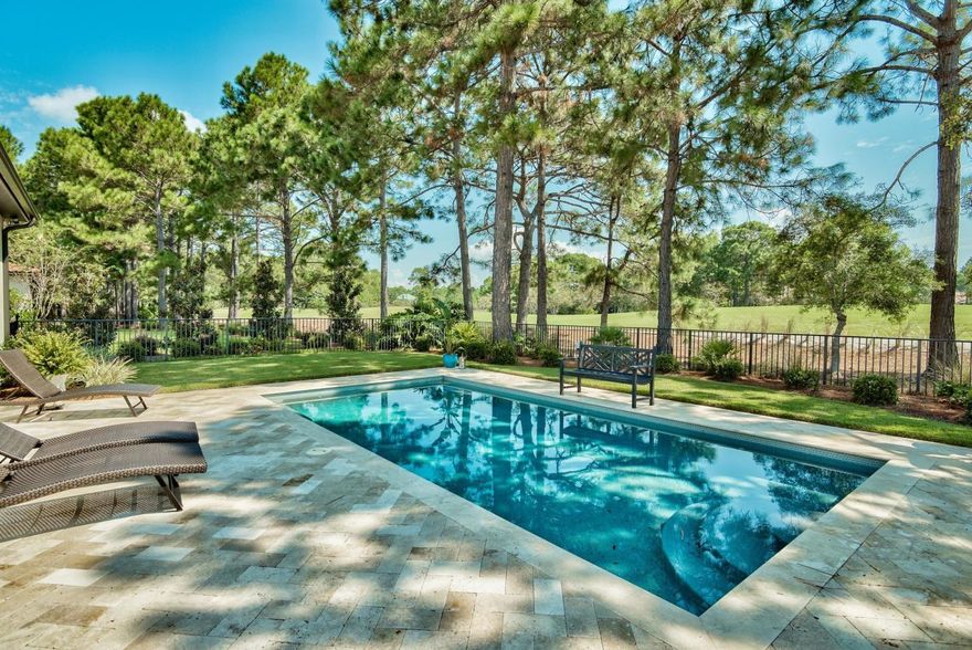 4 BEDROOM 1 STORY HOME ON THE GOLF COURSE WITH A POOL. OPEN CONCEPT, EASY LIVING FLOOR PLAN HOME IS IN IMMACULATE CONDITION WITH UPGRADES GALORE INCLUDING HARDWOOD FLOORS THRU THE MAIN LIVING AREA OF THE HOME AND A CUSTOM BUILT IN TV ENTERTAINMENT CENTER IN LIVING ROOM. THE KITCHEN INCLUDES SUB ZERO, WOLF& BOSCH APPLIANCES WITH A LARGE ISLAND, SEPARATE BAR AREA AND PANTRY. MASTER BEDROOM SUITE IS LARGE AND PRIVATE OVERLOOKING THE POOL. MASTER BATHROOM HAS DOUBLE VANITIES, LARGE WALK IN SHOWER, AND WALK IN CLOSET. THE SUN ROOM IS AN ADDED BONUS WHERE YOU CAN SIT INSIDE THE HOME AND ENJOY THE VIEWS OF THE POOL AND GOLF COURSE. ***NEW PHOTOS COMING SOON***