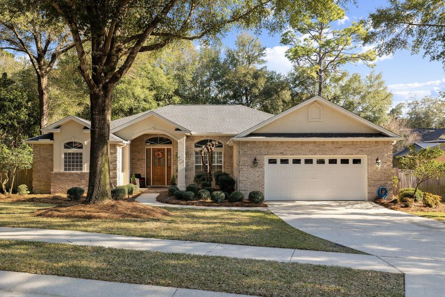 Swift Creek is the definitive premier neighborhood community in the twin-cities region. Adorned with an exceptional location, mature landscaping, and top tier amenities - Swift Creek is an ideal place to establish your new residence in Northwest Florida. As you make your way to 817 Coldwater Creek Circle, you will find yourself insulated from the everyday hustle and bustle of life. Approaching the property you are welcomed into a serene setting presenting outstanding curb appeal as well as timeless architectural charm. A thoughtfully designed layout balances openness and warmth, making you feel right at home from the second you arrive.  The front door and arched transom of the entry-way are simply a sight to see. Offering 4 bedrooms and 3 baths, this residence boasts enough room for the entire family as well as your guests. There are multiple living and dining areas giving you space for peace and practicality. Porcelain tiling has been carried throughout the entire home.  11' ceilings, crown molding, and deep base boards complete the picture of elegance.  The kitchen flows seamlessly into the family room creating an atmosphere where forever memories are sure to be made. Notable features include stainless steel appliances, Corian countertops, and a spacious breakfast bar.  Natural light fills the home providing the distinctive Florida feel sought by many. Bedrooms are positioned in a way that promotes privacy and tranquility.  The primary bedroom is a sanctuary for the owners accompanied by a spacious ensuite bathroom featuring double vanities, a garden tub, walk-in shower, and his and her walk-in closets.  There is a section of the home equipped with a private entrance accompanied by its own bed and bath.  The great room of the home features plenty of space as well as a gas burning fireplace perfect for the seasonal weather we are fortunate to enjoy.  Perhaps one of the most enticing features of the home is a climate controlled retreat at the back of the property just above 300 square feet.  The bookshelves and bricks that permeate the space present a character and setting that must be seen in person.  The 2 car garage has built in shelving for your tools, fishing rods, and more.  It also includes a secondary refrigerator.  Out back you will find a gazebo equipped with power and a flat screen TV, perfect for outdoor living and entertaining.  From the moment you arrive it is evident the home has been loved and cared for and is now poised for its next owners to possess.  Located close to Eglin Air-Force base and a top ranked "A" rated school system.  Schedule your showing today!