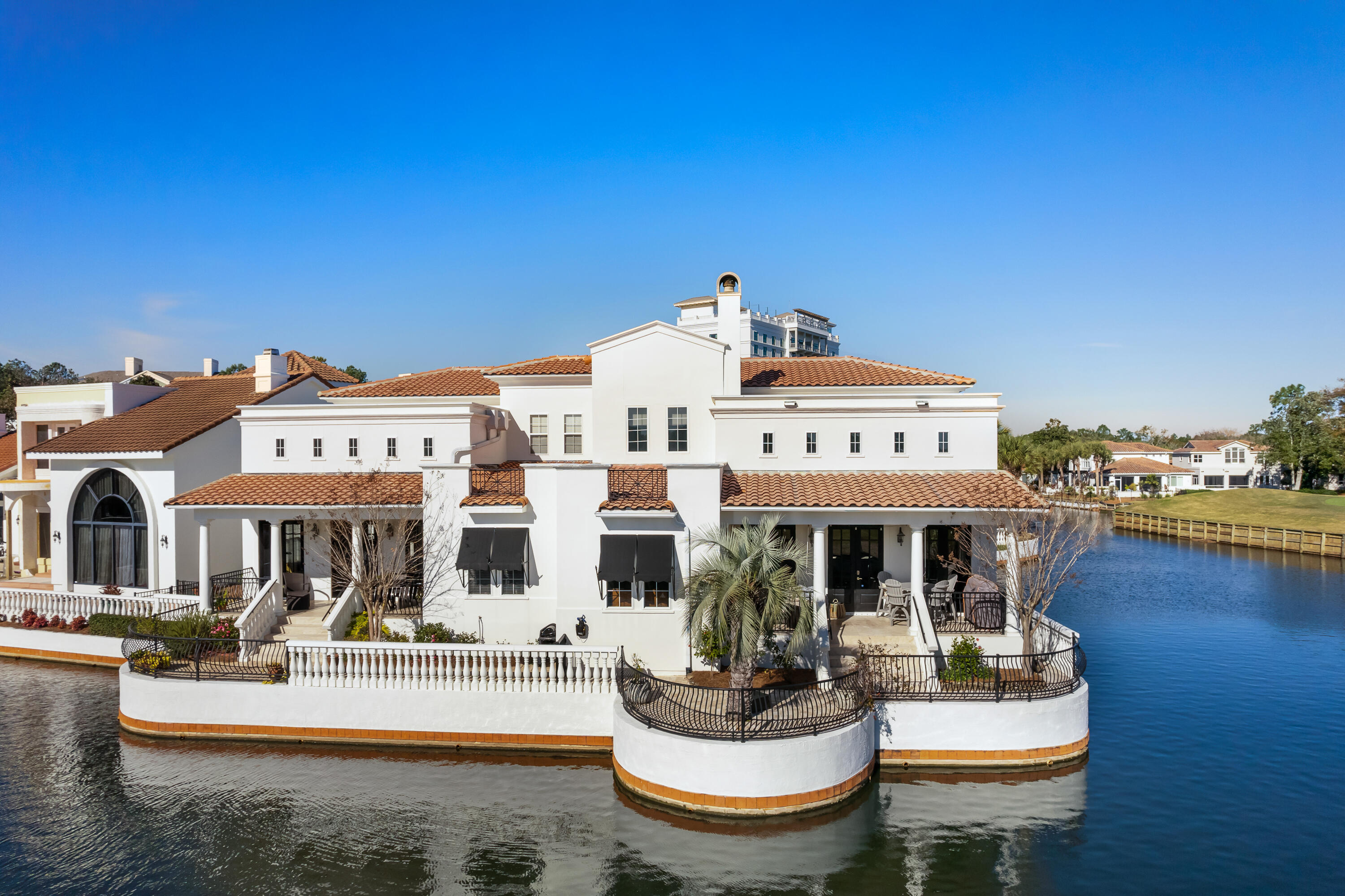 REDUCED $250k FROM ORIGINAL ASKING PRICE!  Over $250K in renovation.  This exquisitely renovated two story Mediterranean Villa is located in the gated community of the Fountains on the Sandestin Golf and Beach Resort. The location is ideal; walking distance to the Village of Baytowne, the tennis courts and the Marina. The living area features an open floorplan with fireplace, built-in surround sound, and a kitchen designed for effortless entertaining. Two French doors open onto the back porch which is private and secluded with 180 degrees views of the golf course and canal. The spacious master bedroom and huge walk-in closets are located on the first floor. The second floor has two bedrooms,  two adjoining bathrooms and a loft/office space The two car garage is heated and cooled.