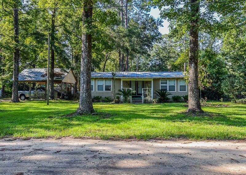 This home is located in the waterfront community of Charlotte Estates. The community offers a community park and boat ramp on Black Creek. The Home is located right across the road from the boat ramp and park offering easy access and views of the Creek. From Black Creek you also have access to the Choctawhatchee River and the Bay. There are unlimited opportunities for fishing, hunting or just being on the water. The original home was a mobile home but has been added onto to provide a larger living space. This quiet community is a great place to live or use for a vacation spot.